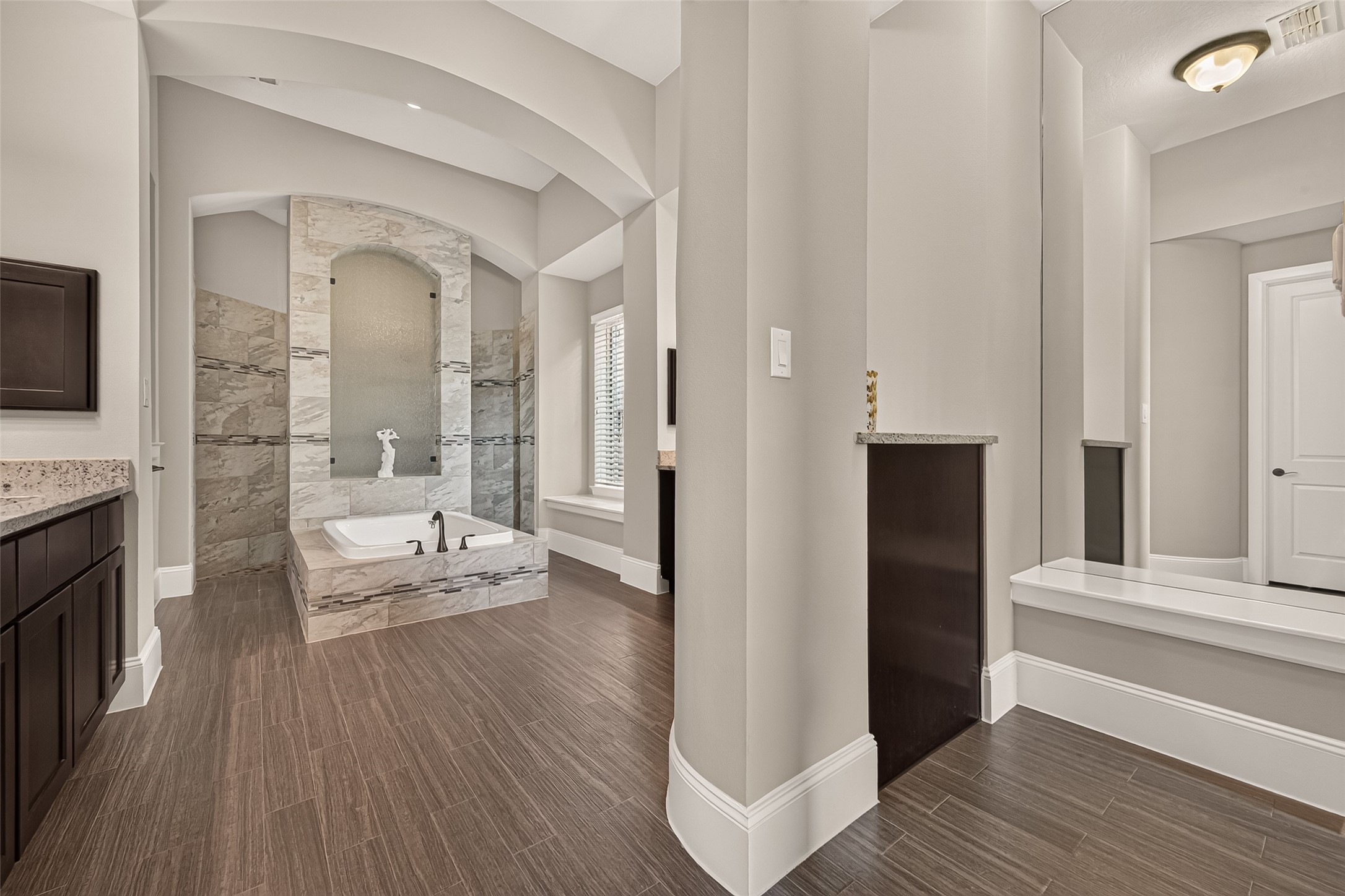 Grand Primary Bath with Large Soaking Tub and Walk In Texas Sized Shower
