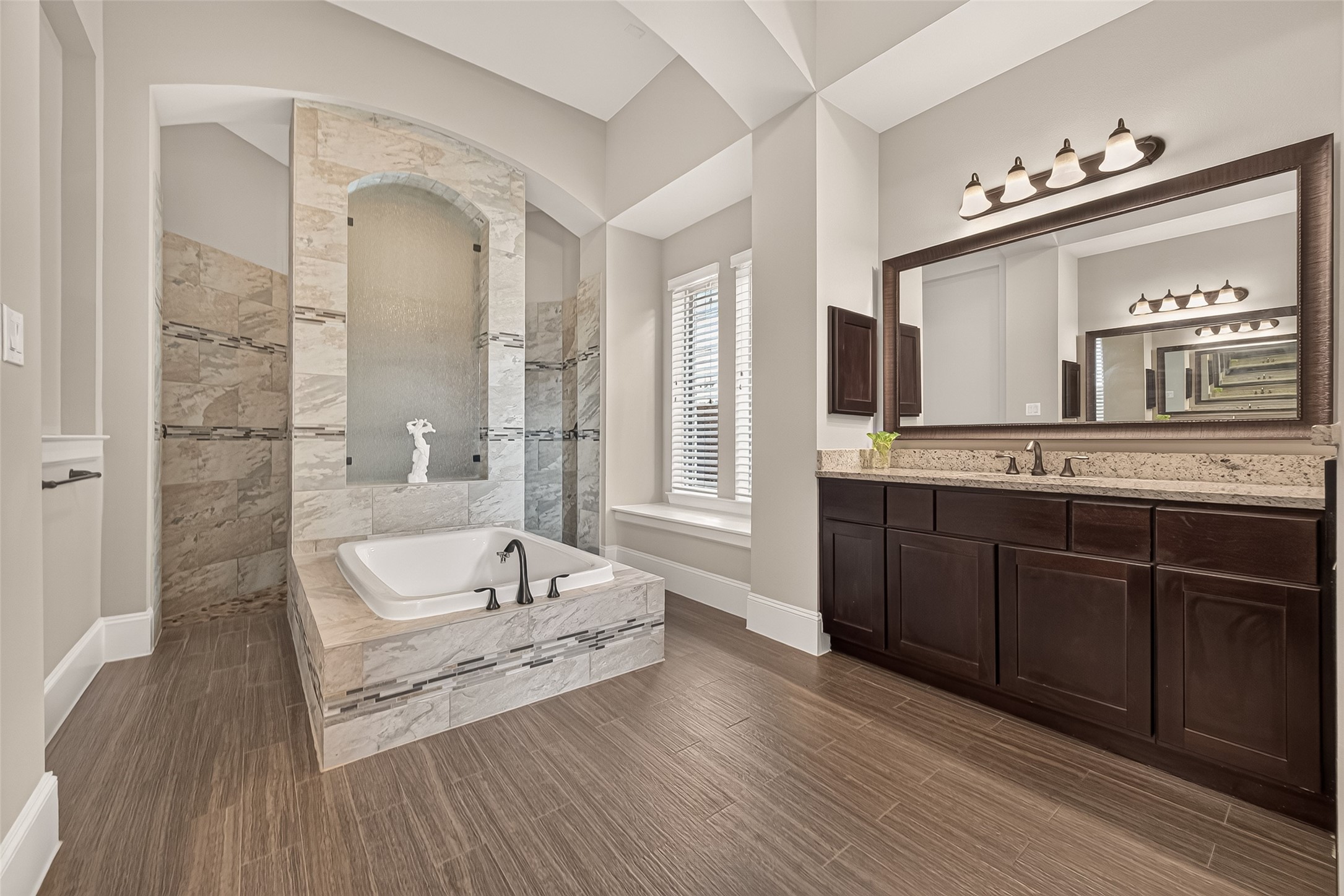 Grand Primary Bath with Large Soaking Tub and Walk In Texas Sized Shower