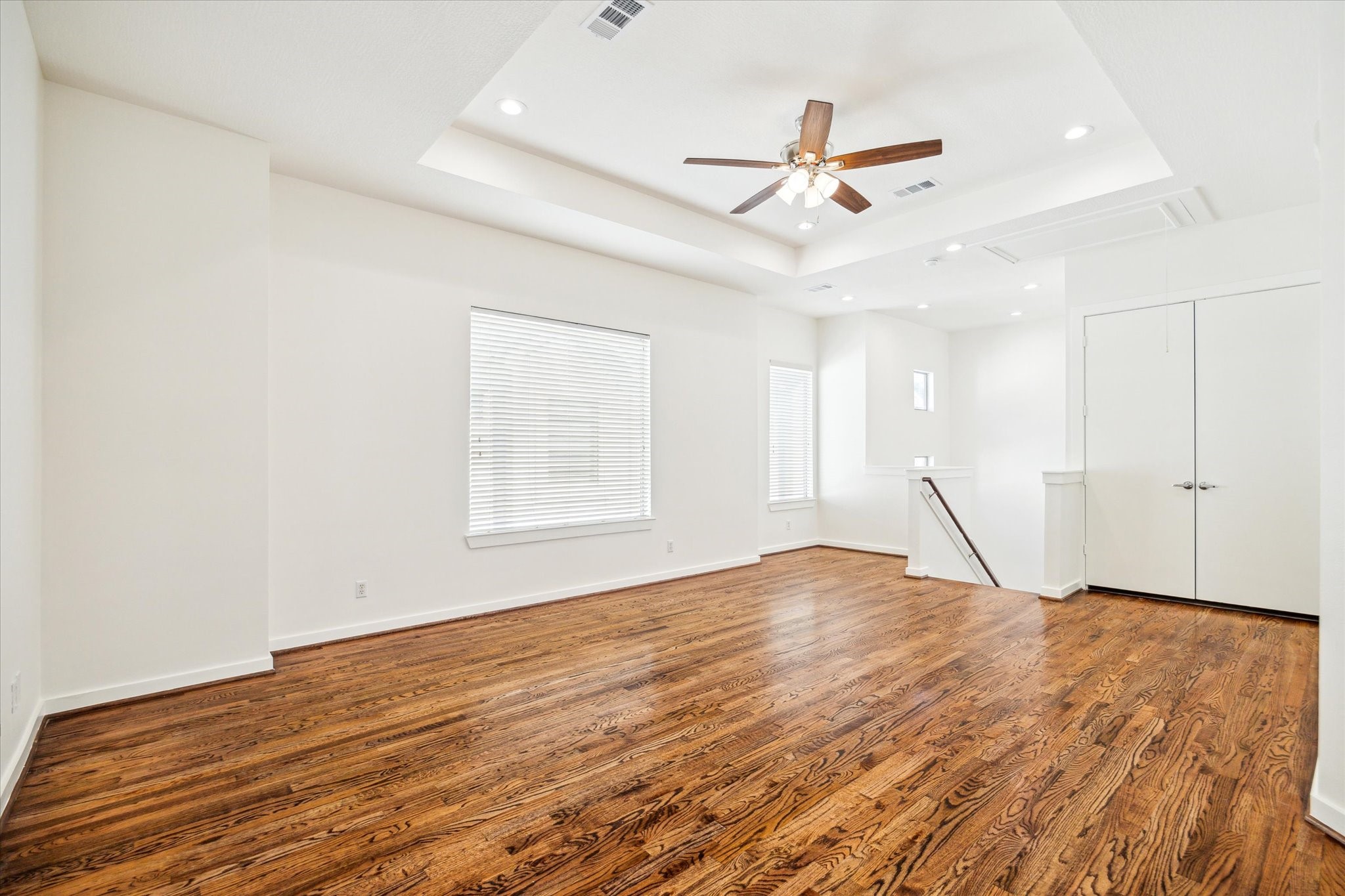 The oversized living room/dining area allows plenty of options for furniture arrangement. Beautiful hardwoods!