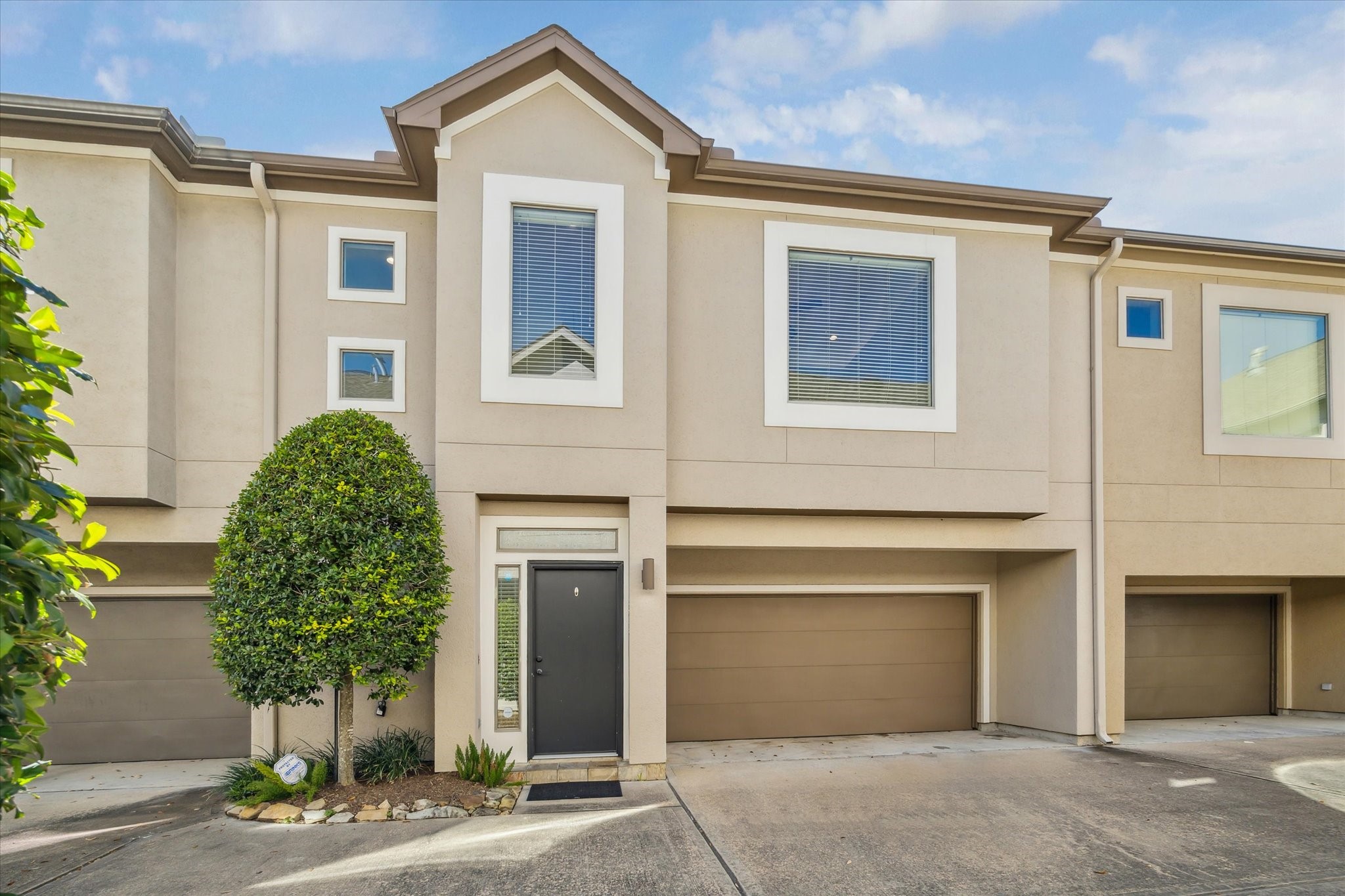 Well maintained two story townhome with attached two car garage