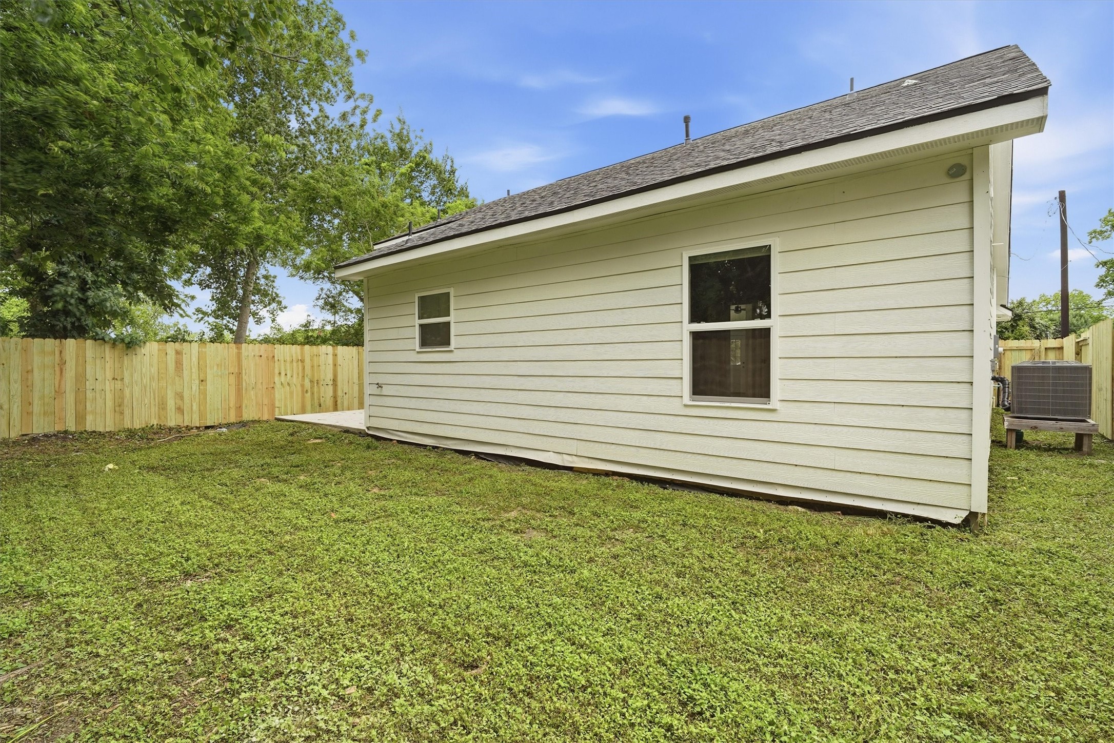 Spacious back yard, brand new privacy fence