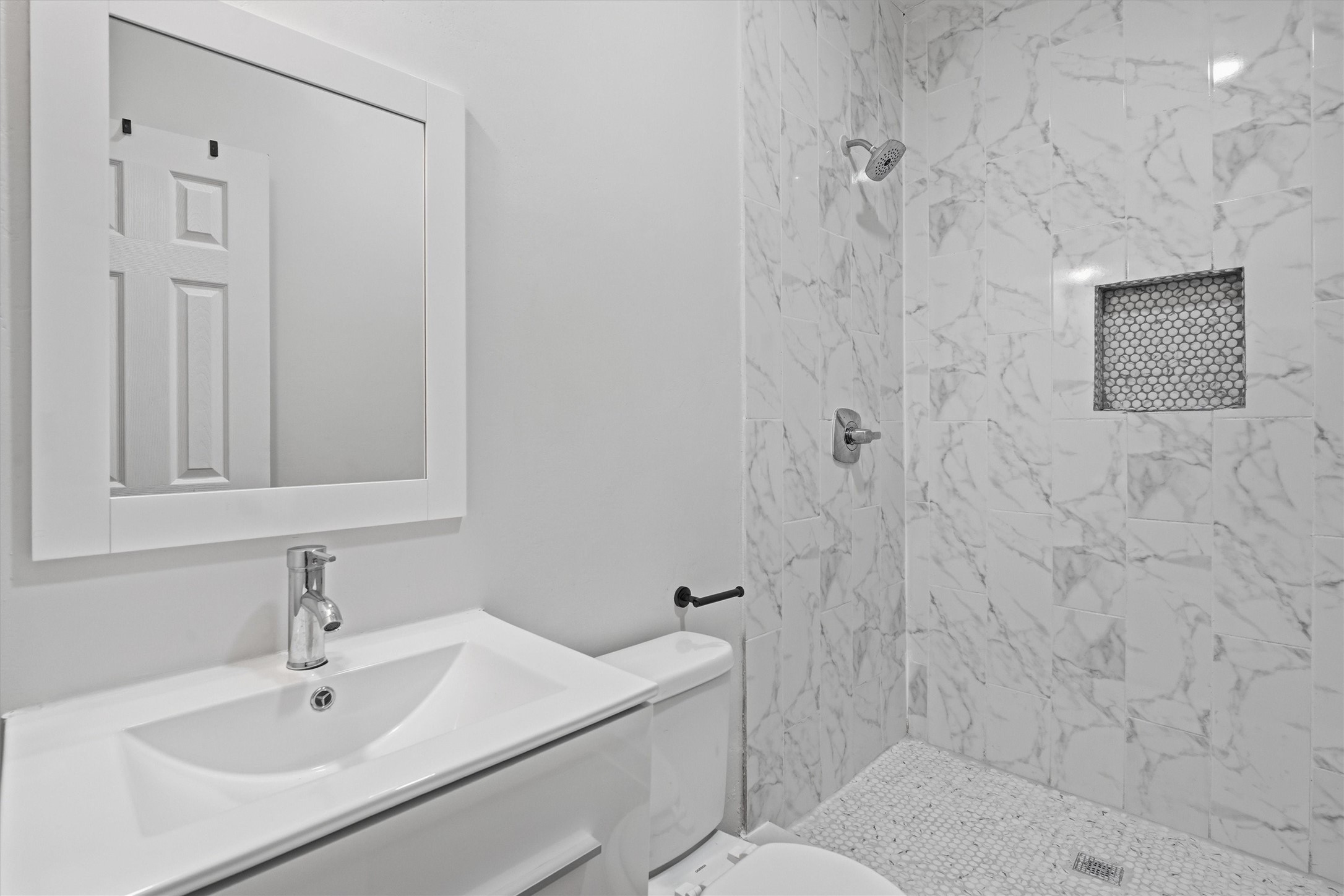 Secondary bathroom, fully tiled stand alone shower