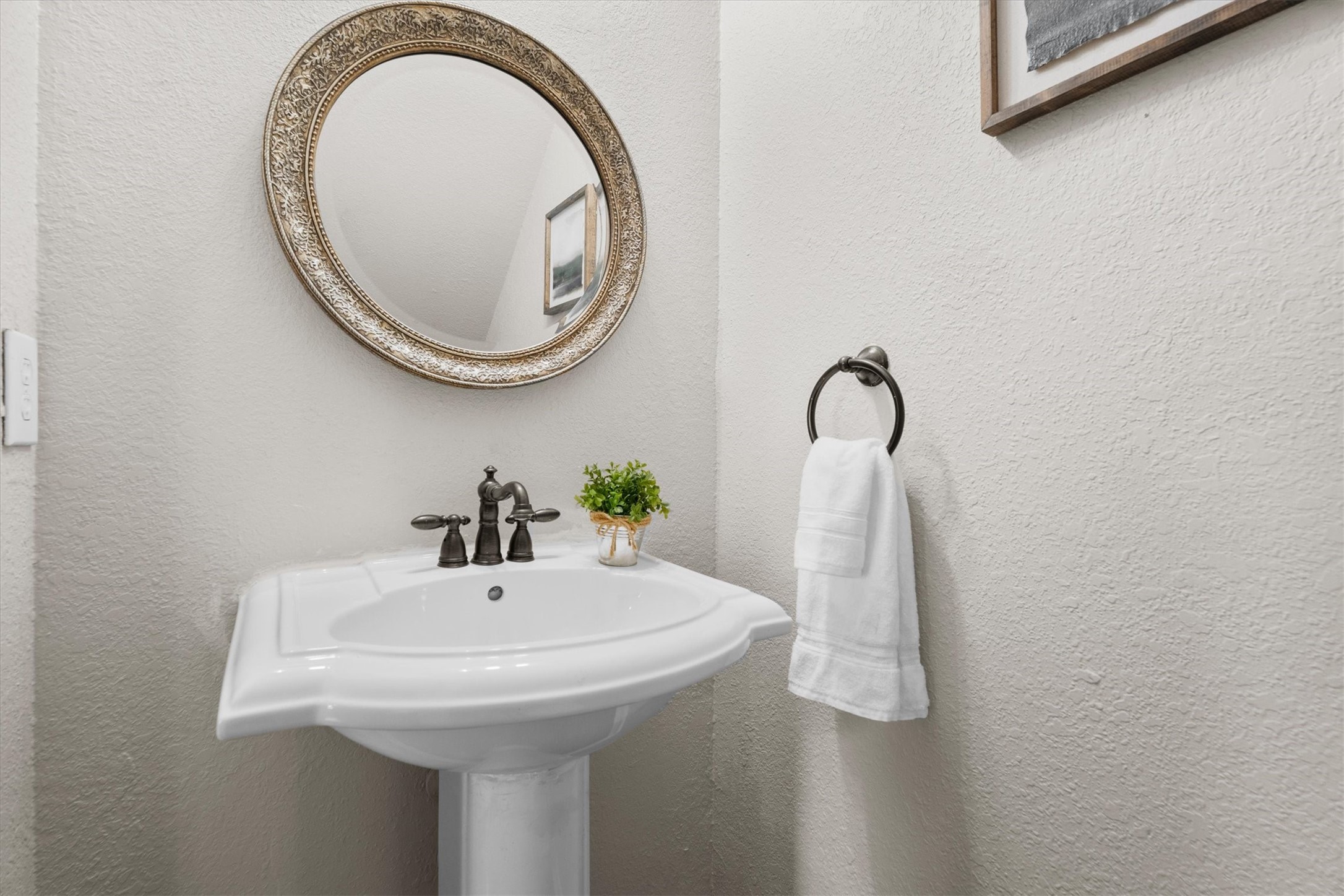 Convenient half bath located on the first floor.