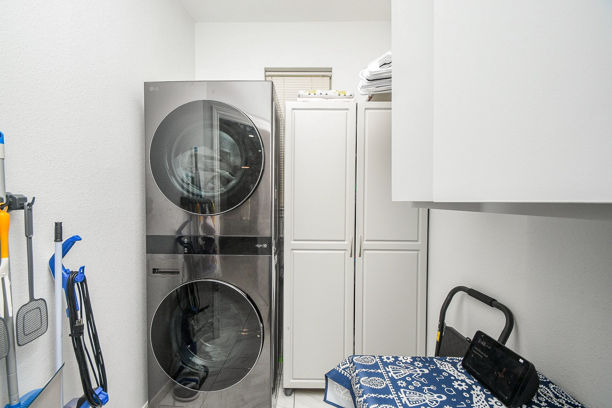 Laundry room conveniently located off the kitchen.