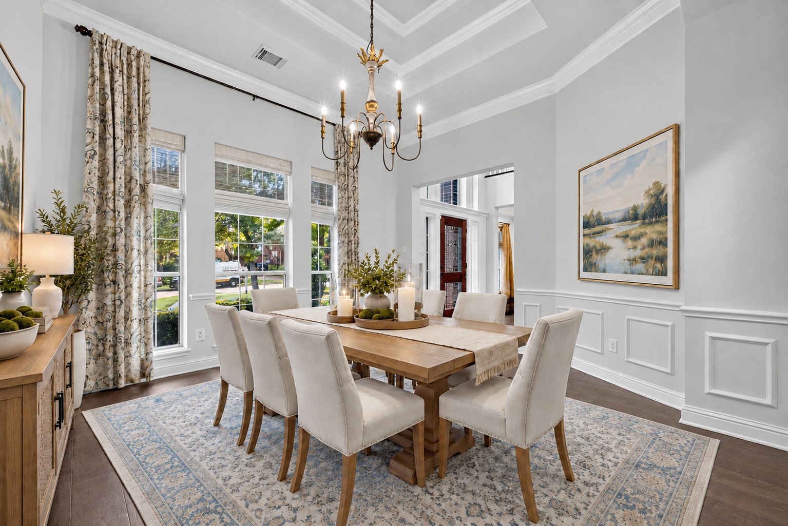 VIRTUALLY STAGED FOR DINING & ENTERTAINING! Imagine this beautiful room furnished with a generous dining table, comfortable upholstered chairs & a buffet for serving your favorite dishes. From Thanksgiving dinner with all the trimmings to a candlelit evening with friends, this virtually staged image illustrates how easily the Formal Dining Room can become a welcoming place to gather, celebrate & make memories. Just add your favorite people.
