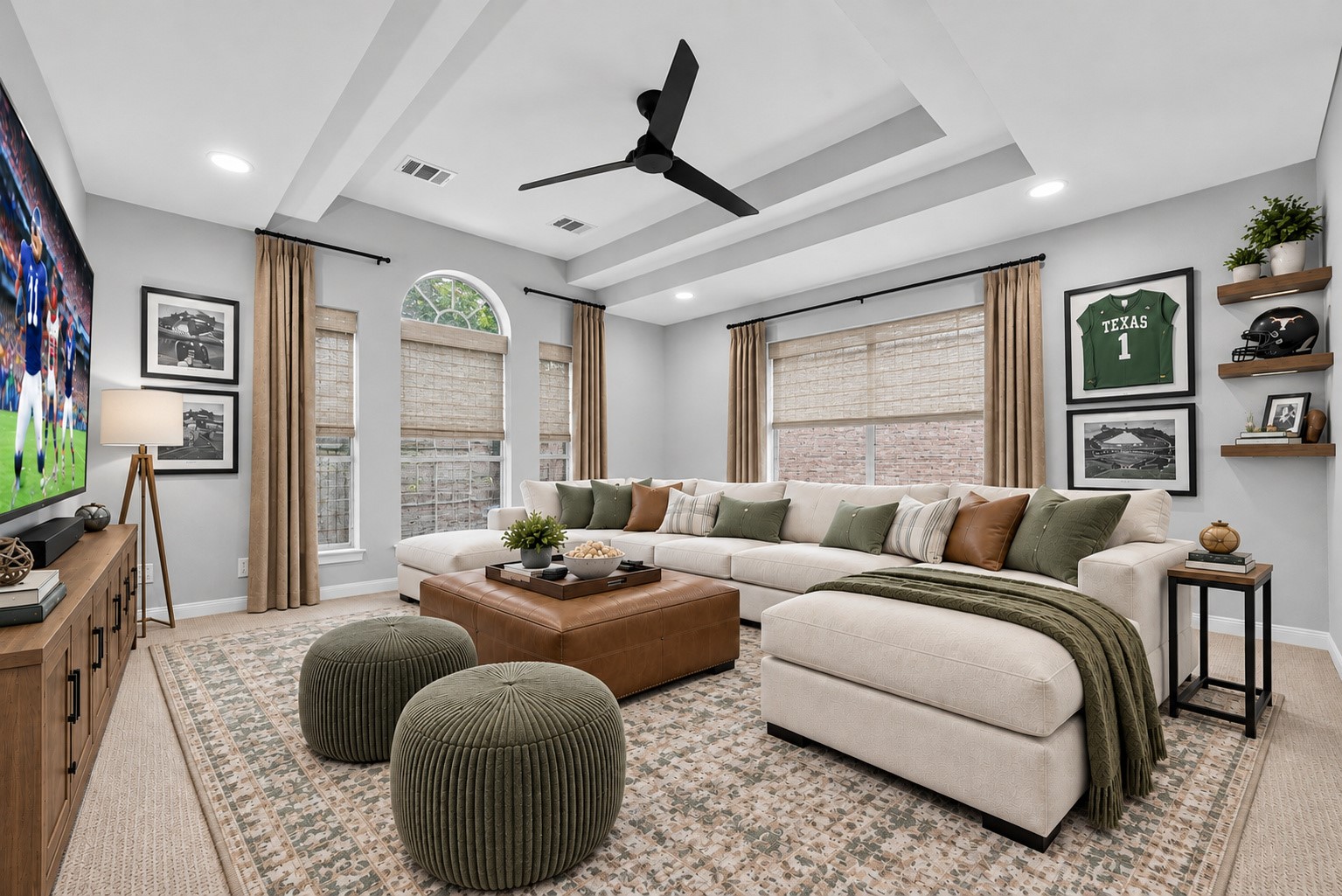 VIRTUALLY STAGED FOR GAME DAY & MOVIE NIGHT! Imagine settling into a comfortable sectional with a bowl of popcorn, cheering on your favorite team or inviting friends over for a movie marathon. This virtually staged Game Room illustrates how easily the spacious layout accommodates a large sectional, oversized ottoman & entertainment center. Whether it's football season, movie night or a lazy Sunday afternoon, this inviting upstairs retreat offers another wonderful place to gather.