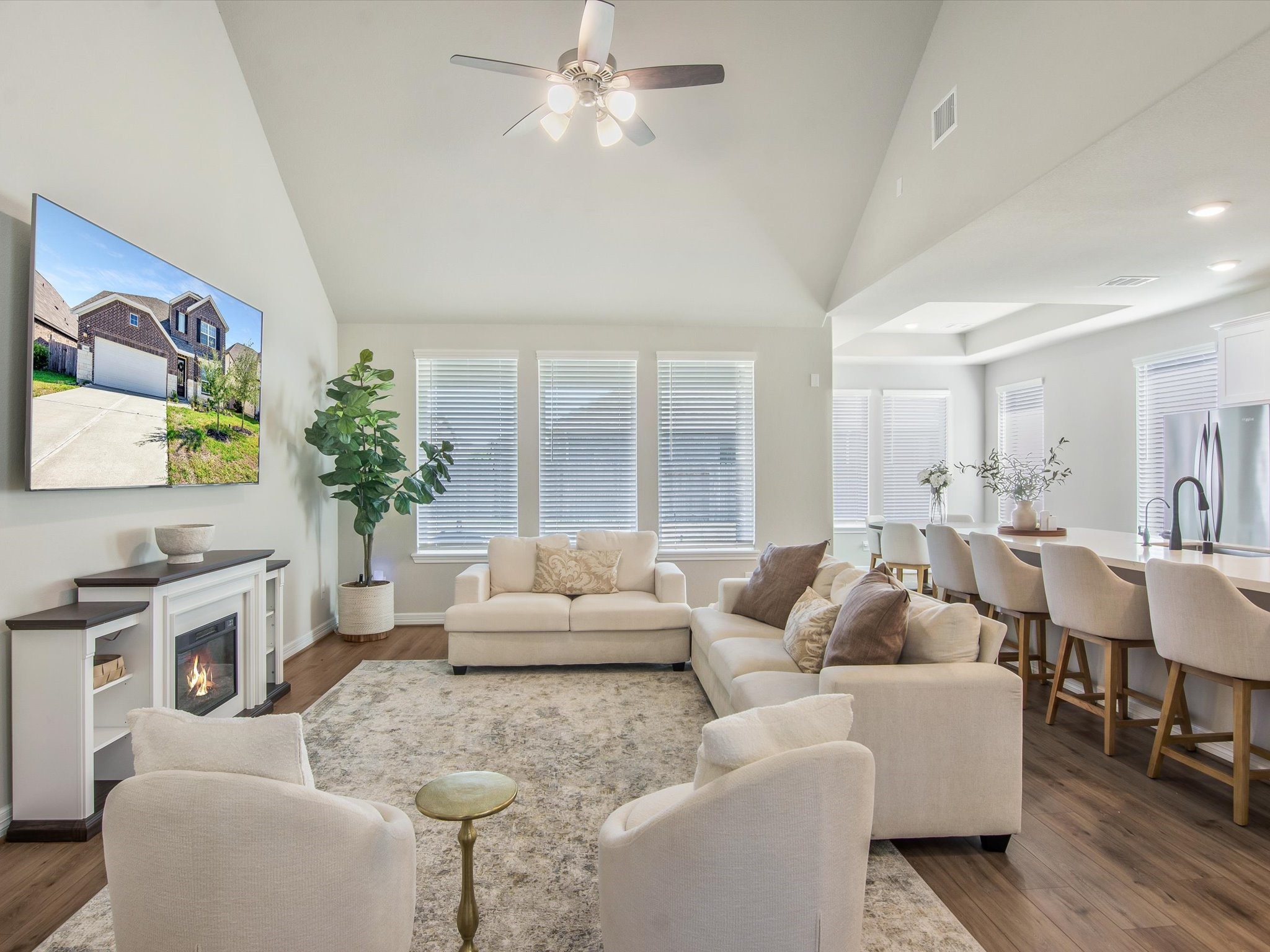 Vaulted ceilings and a wall of windows in the living room Vaulted ceilings and a wall of windows in the living room