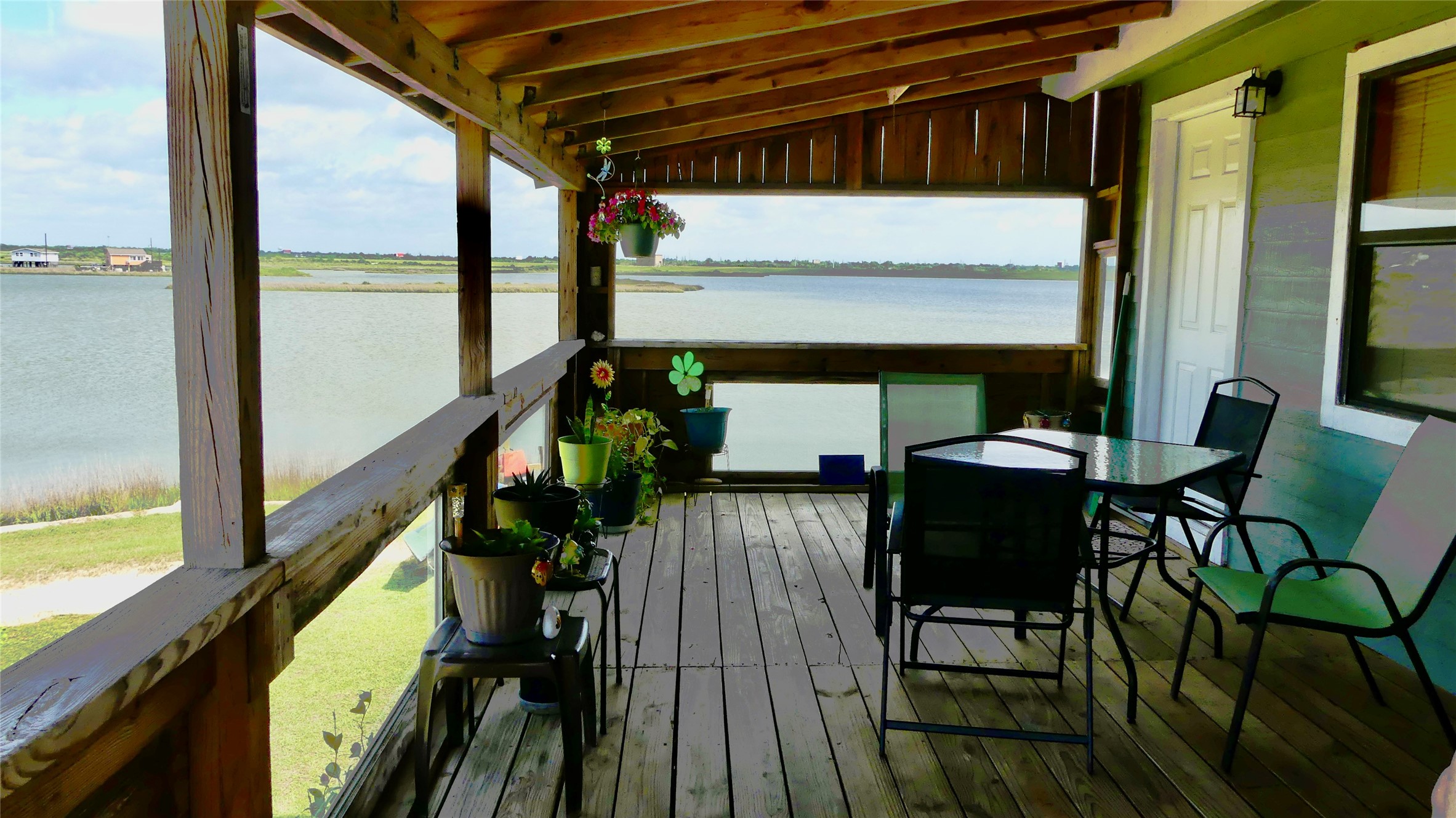 Covered deck to enjoy the waterfront views