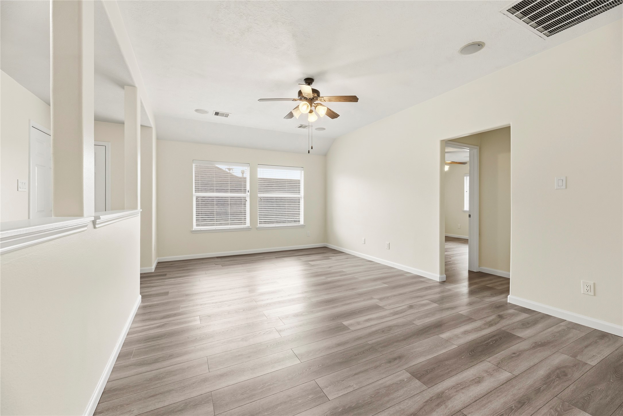Versatile upstairs game room.