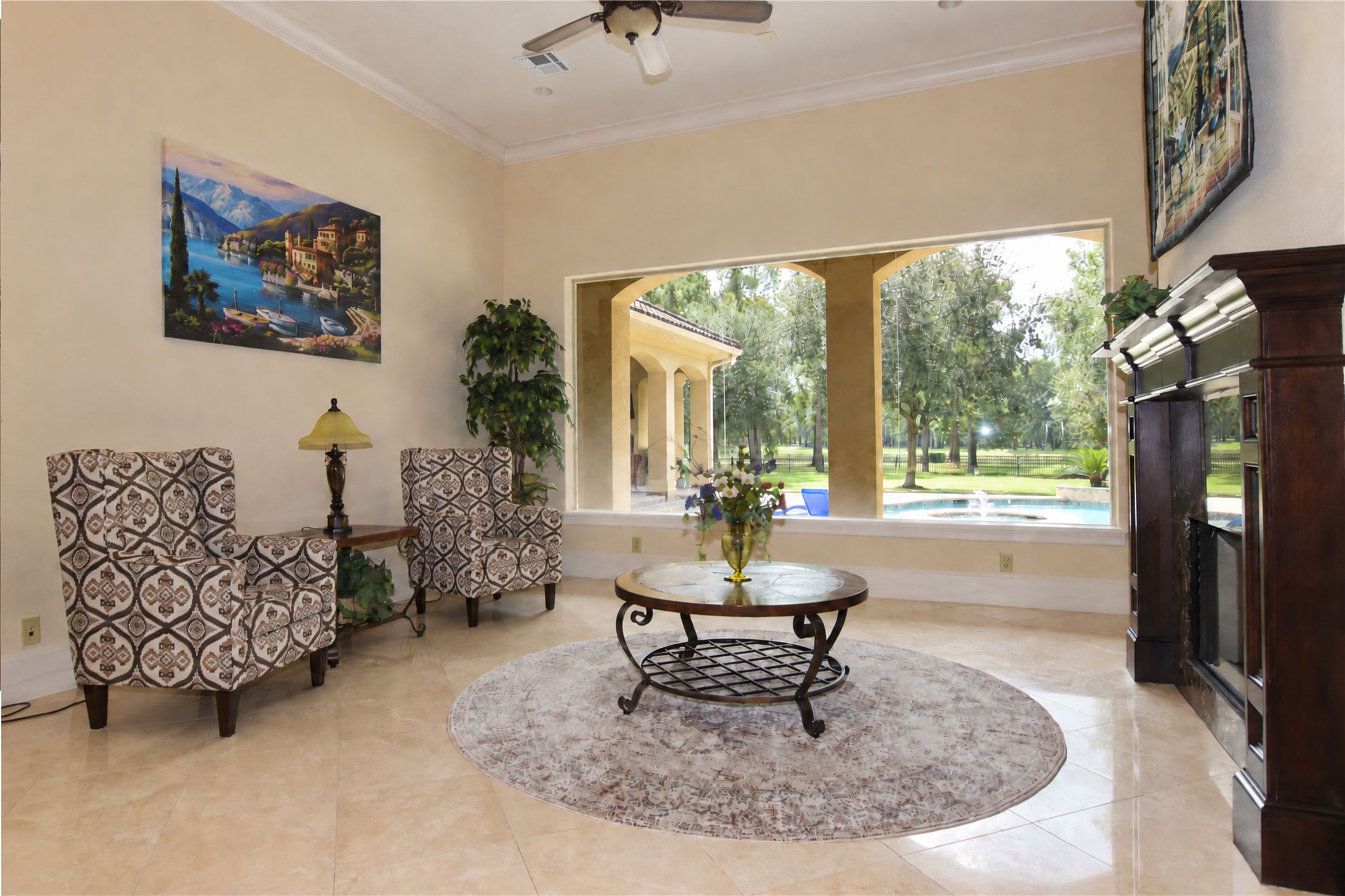 Sitting area overlooking the swimming pool and the lake.
