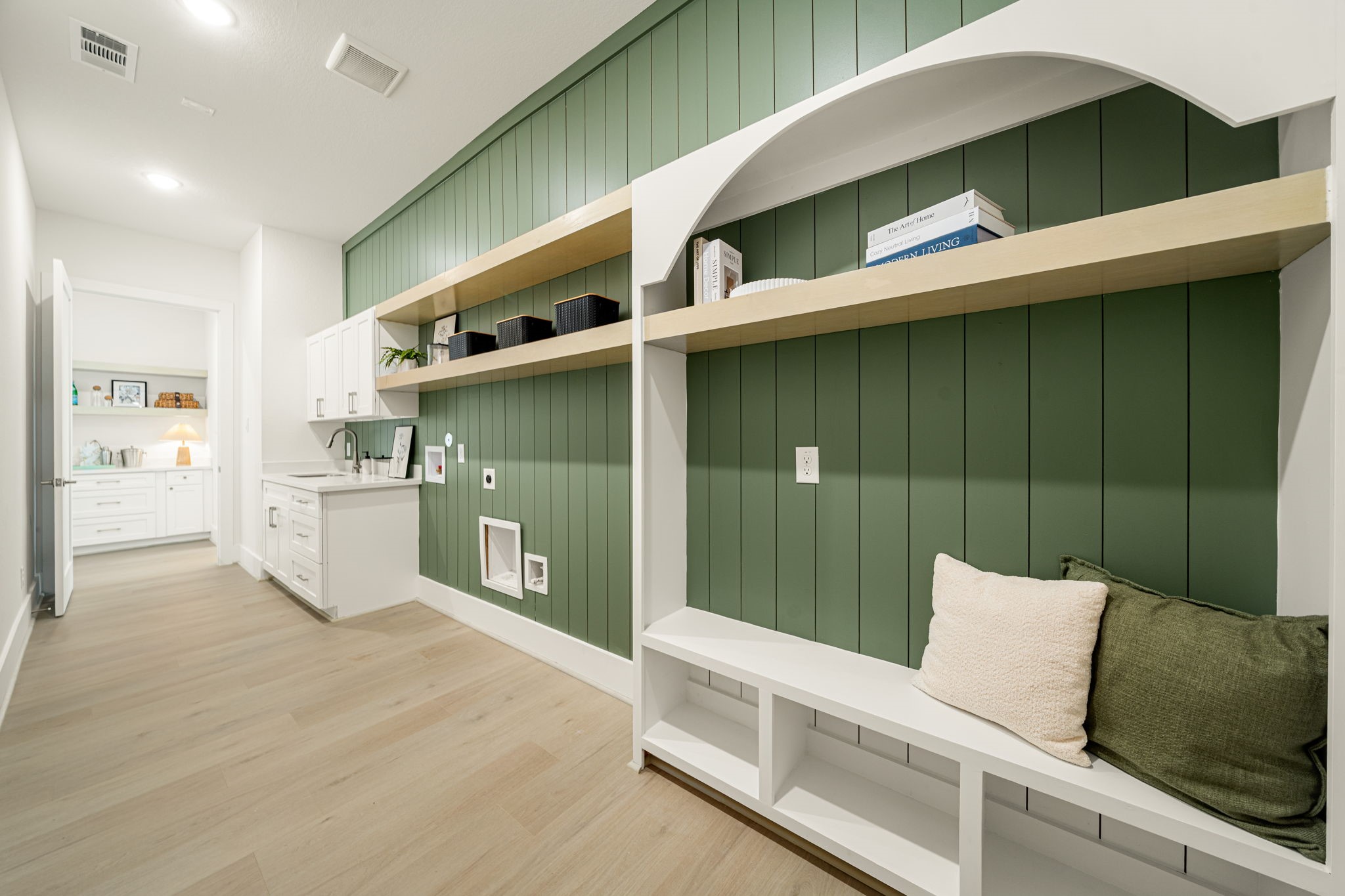 Custom mudroom with built-in seating, storage cubbies, and a convenient drop zone for everyday essentials.