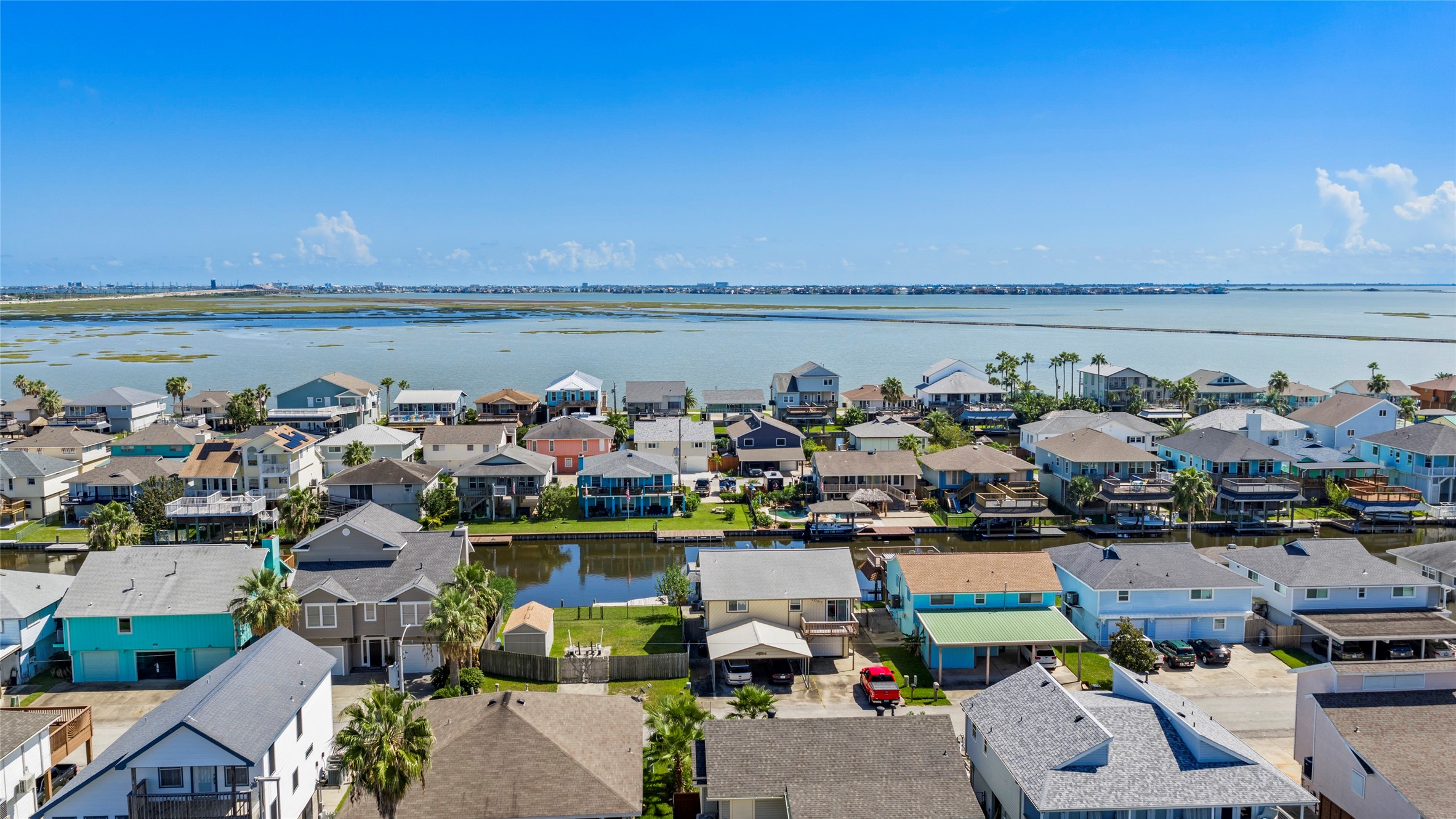 Enjoy the coastal life in your new waterfront home in Bayou Vista