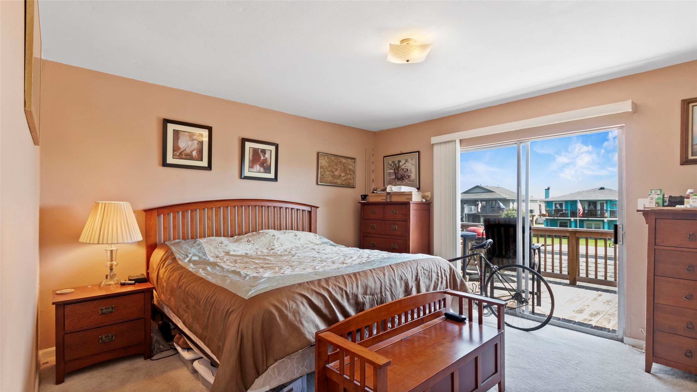 Large bedroom with private balcony access