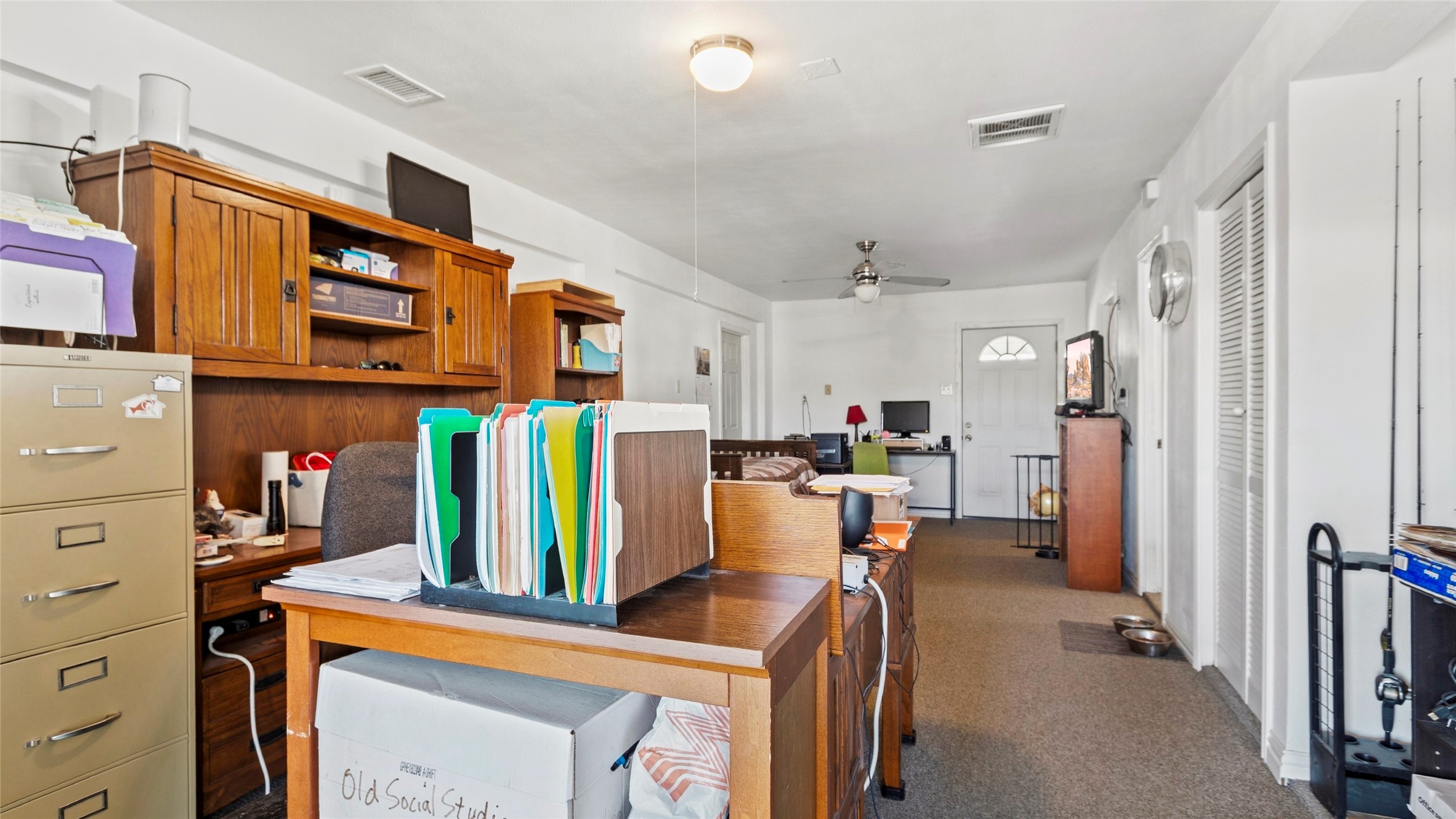 Downstairs boasts a large flexible ground-level suite complete with its own private bath and private entranceideal as a 3rd bedroom, guest quarters, or home office.