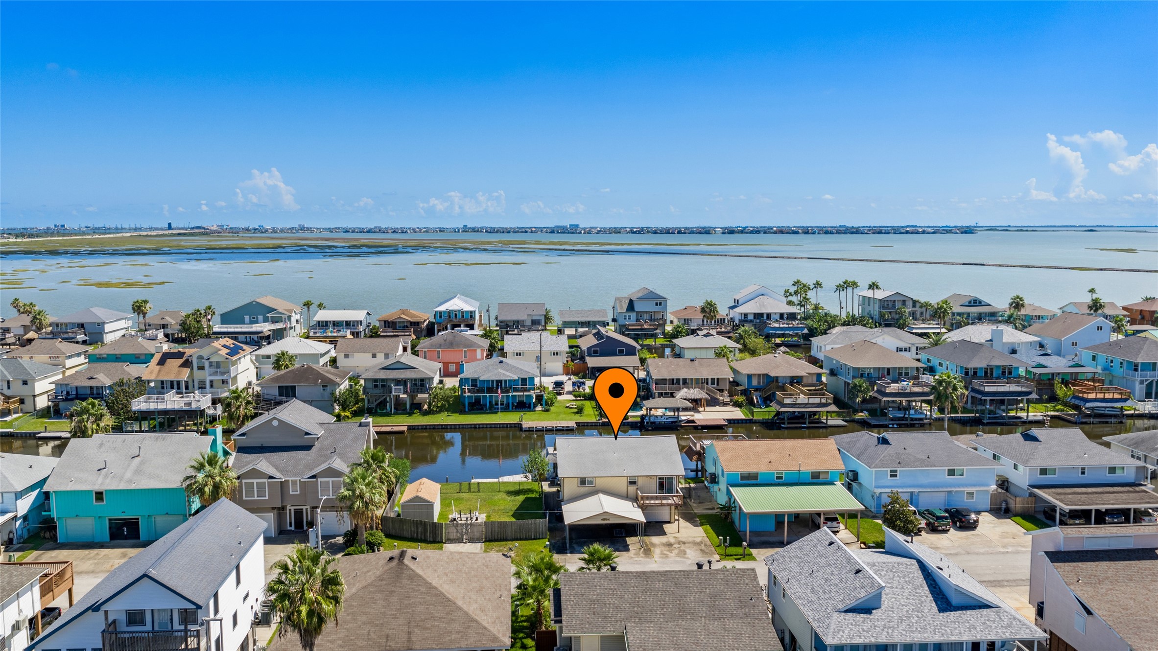 Enjoy the coastal life in your new waterfront home in Bayou Vista
