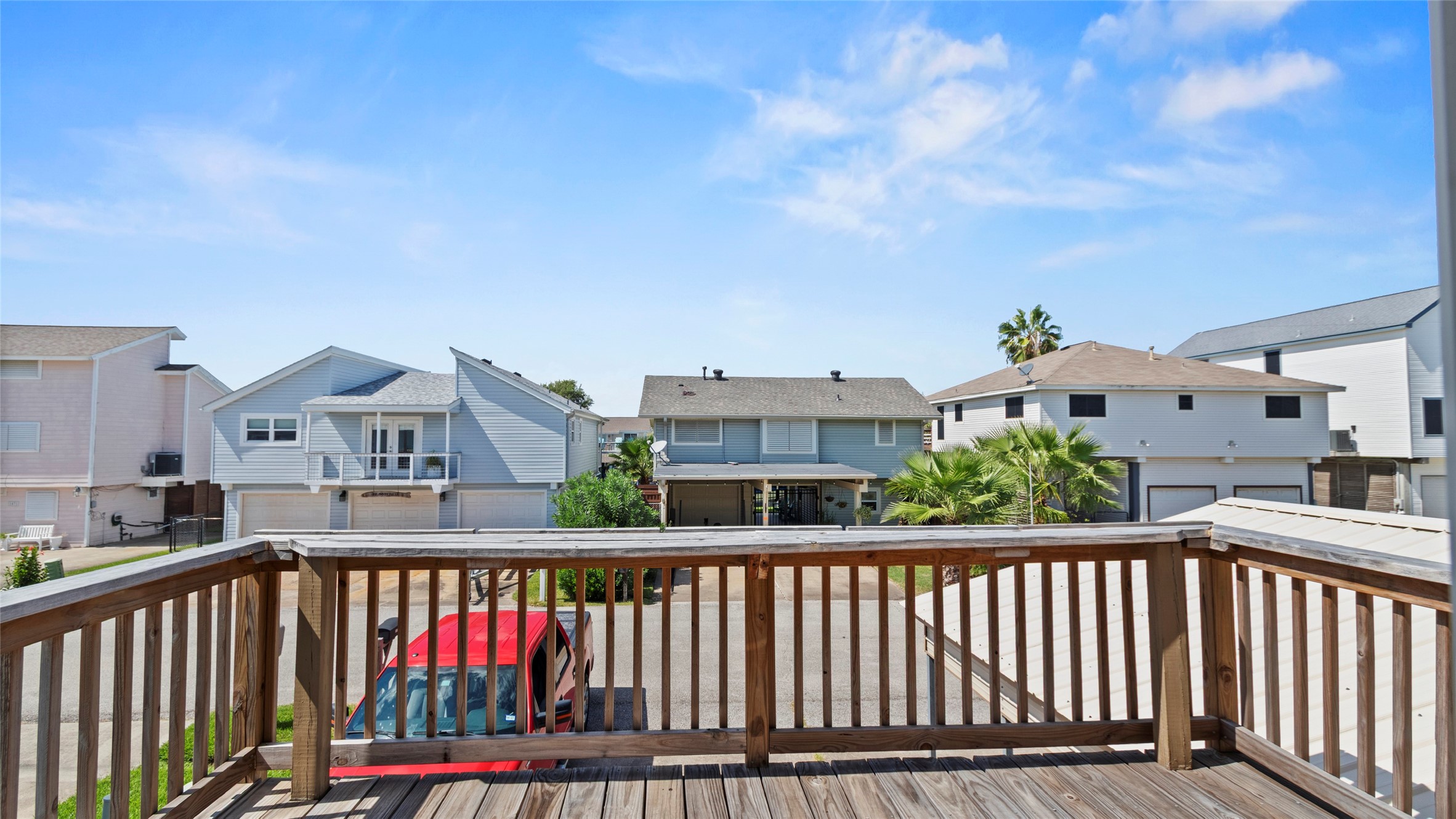 Deck off the kitchen overlooking the street