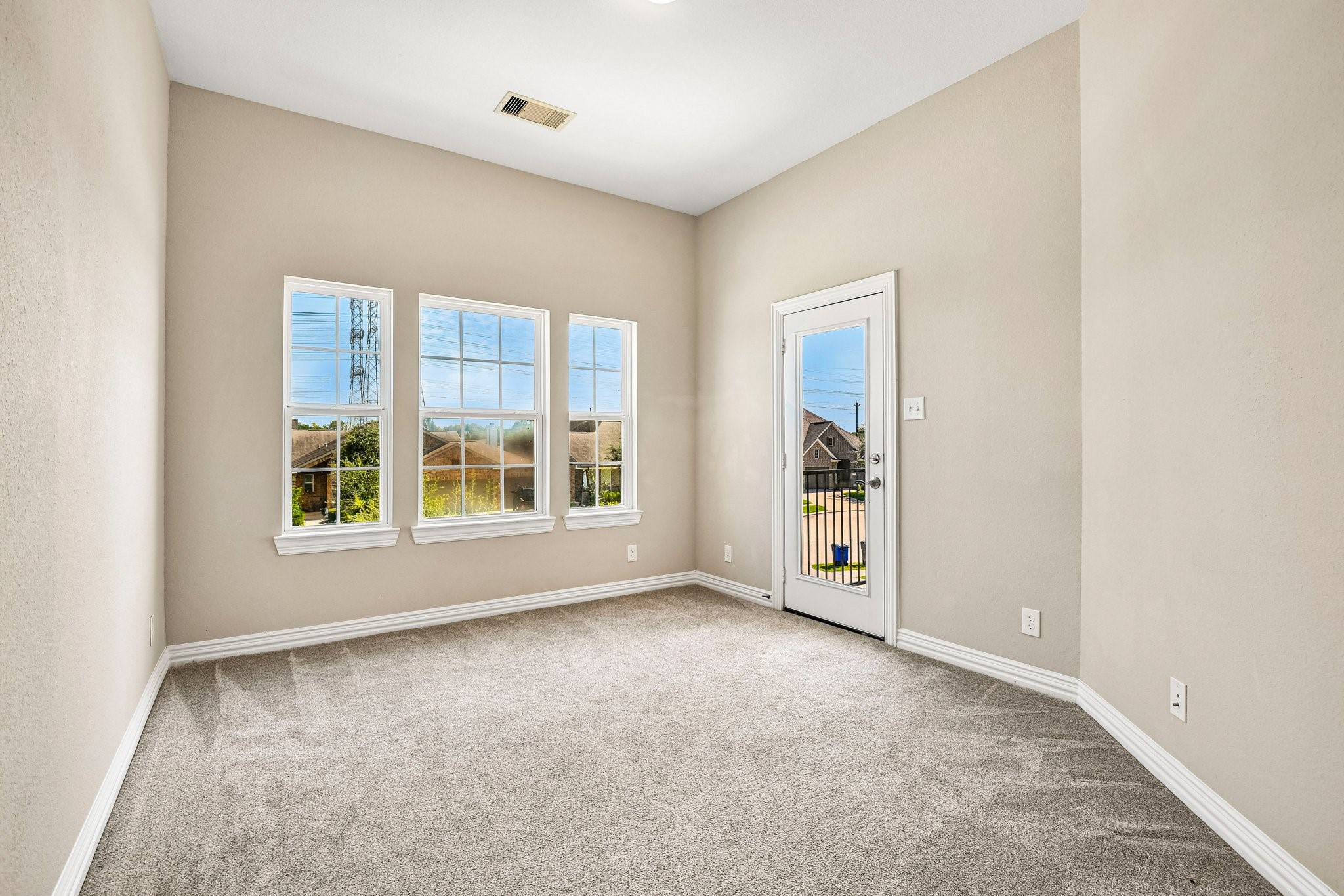 Upstairs Bedroom with access to private balcony!