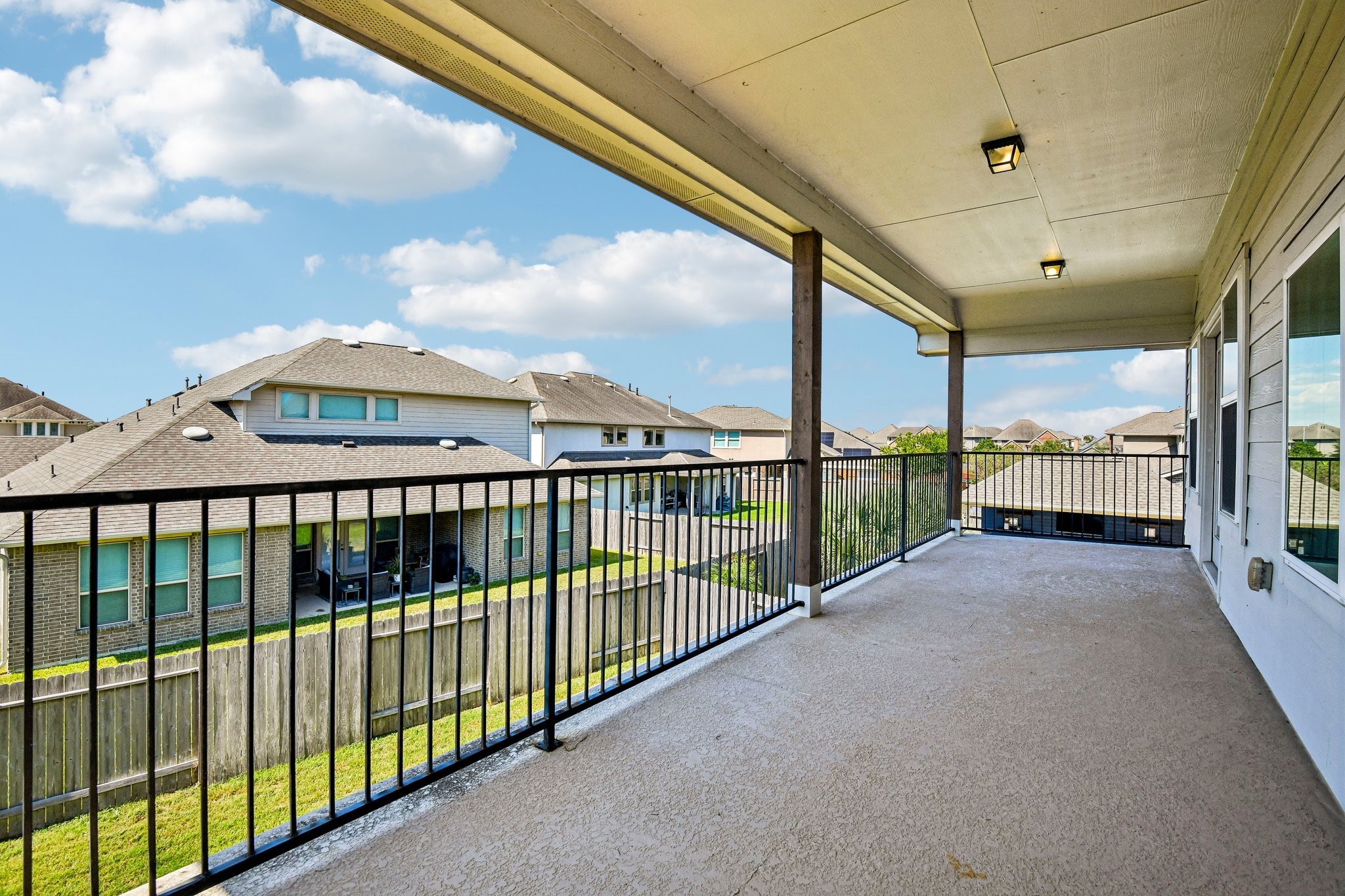 HUGE outdoor balcony overlooking back yard