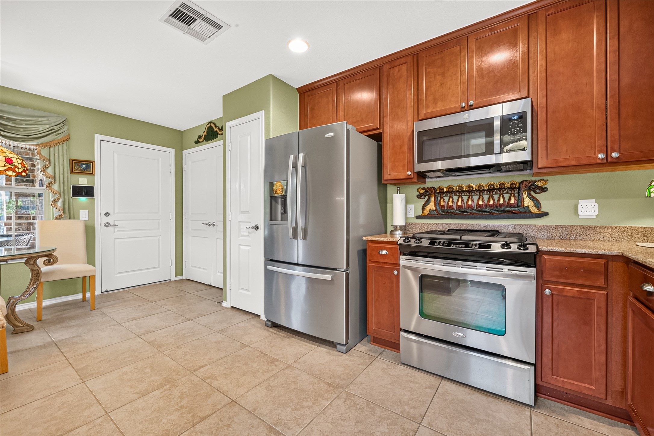 A well-appointed kitchen with generous cabinet space.
