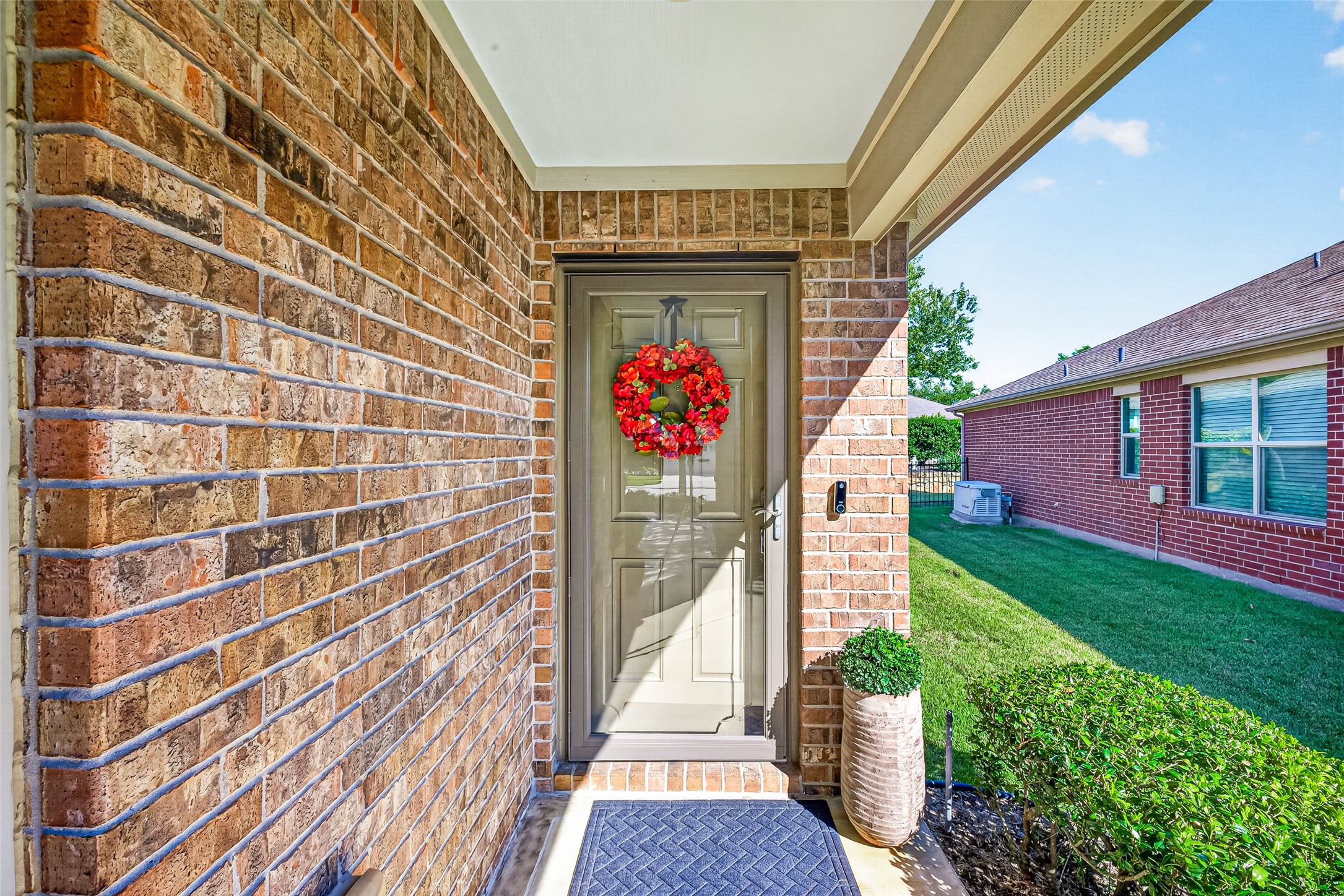 A charming arched entrance makes a warm first impression. A charming arched entrance makes a warm first impression.