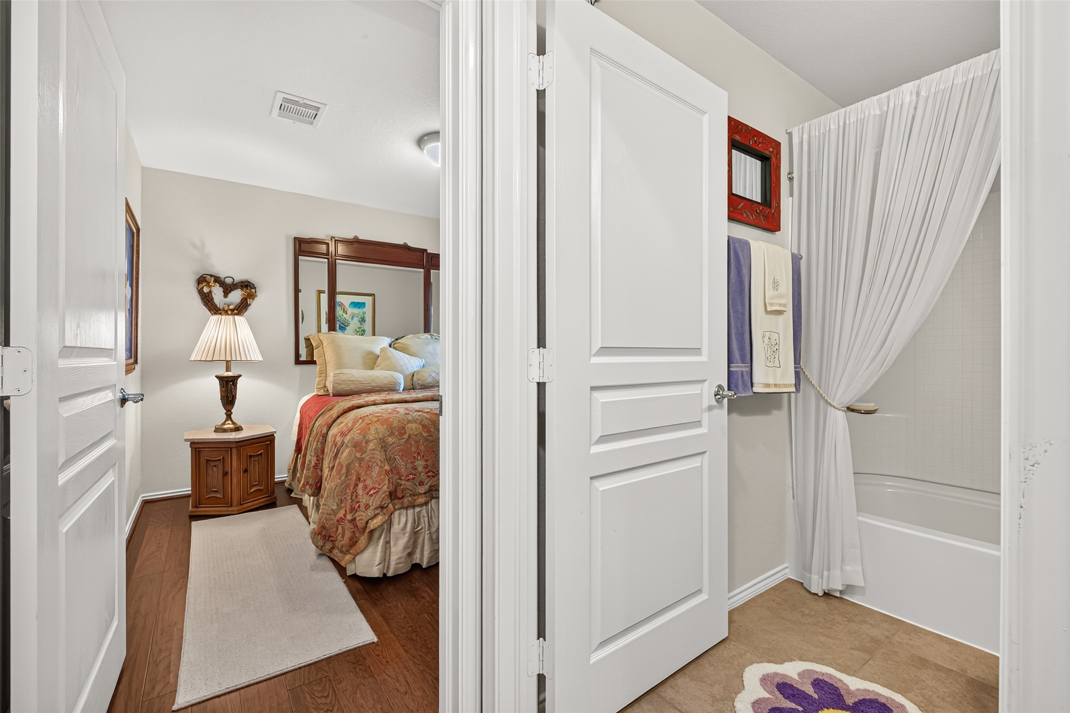 Convenient hallway storage keeps everyday essentials neatly tucked away.