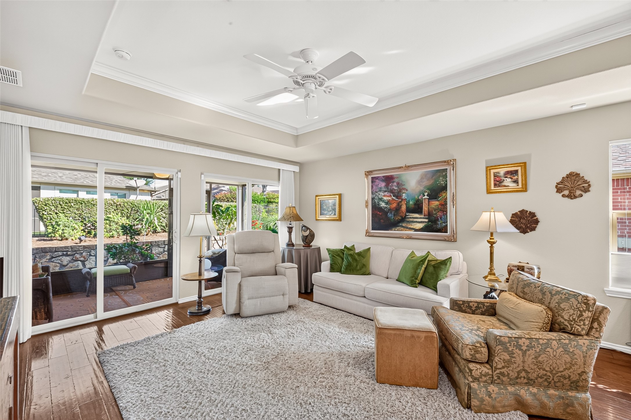 Natural light and patio access brighten this comfortable living area. Natural light and patio access brighten this comfortable living area.