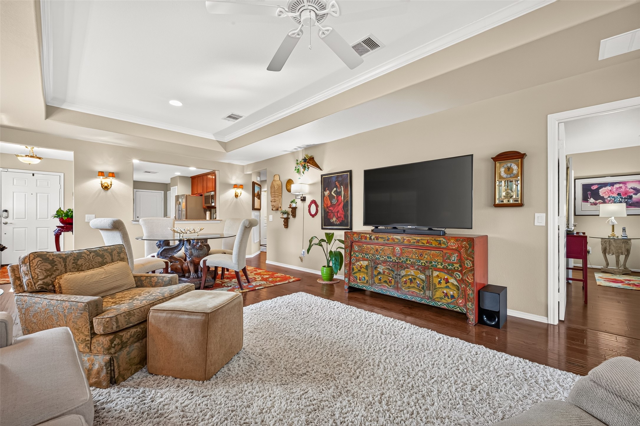 A spacious living room with an easy flow into the dining area.