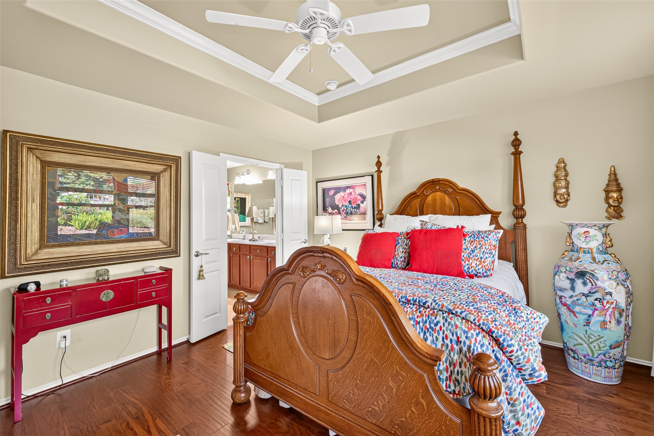 Warm finishes and thoughtful details make this bedroom feel like home.