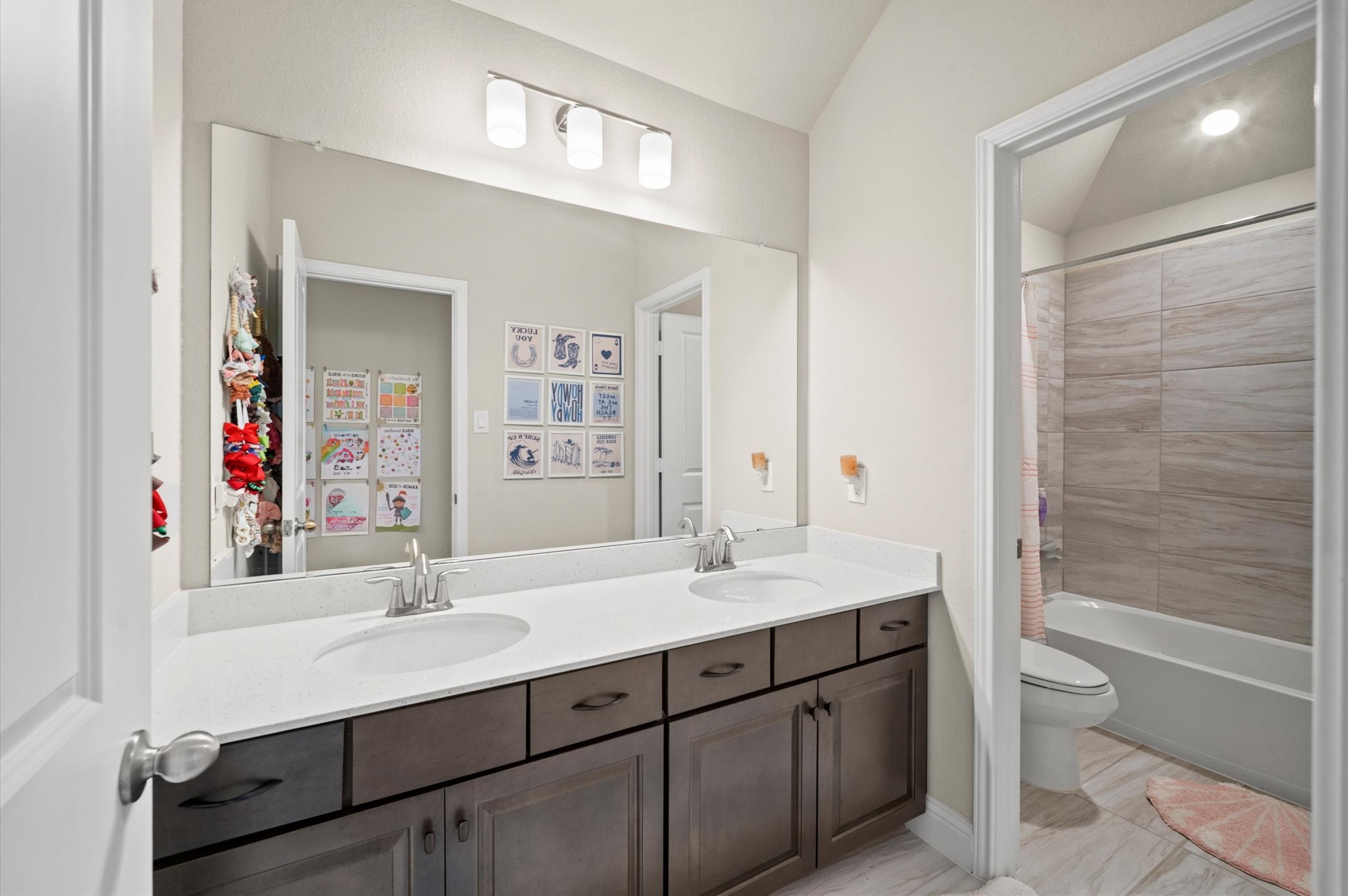 Guest bathroom with double sinks.