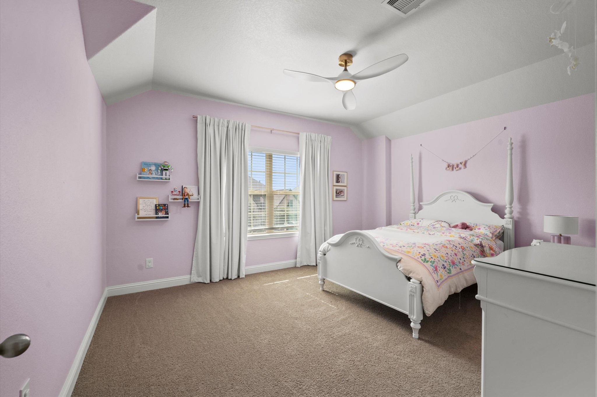 One of two generous sized bedrooms upstairs.