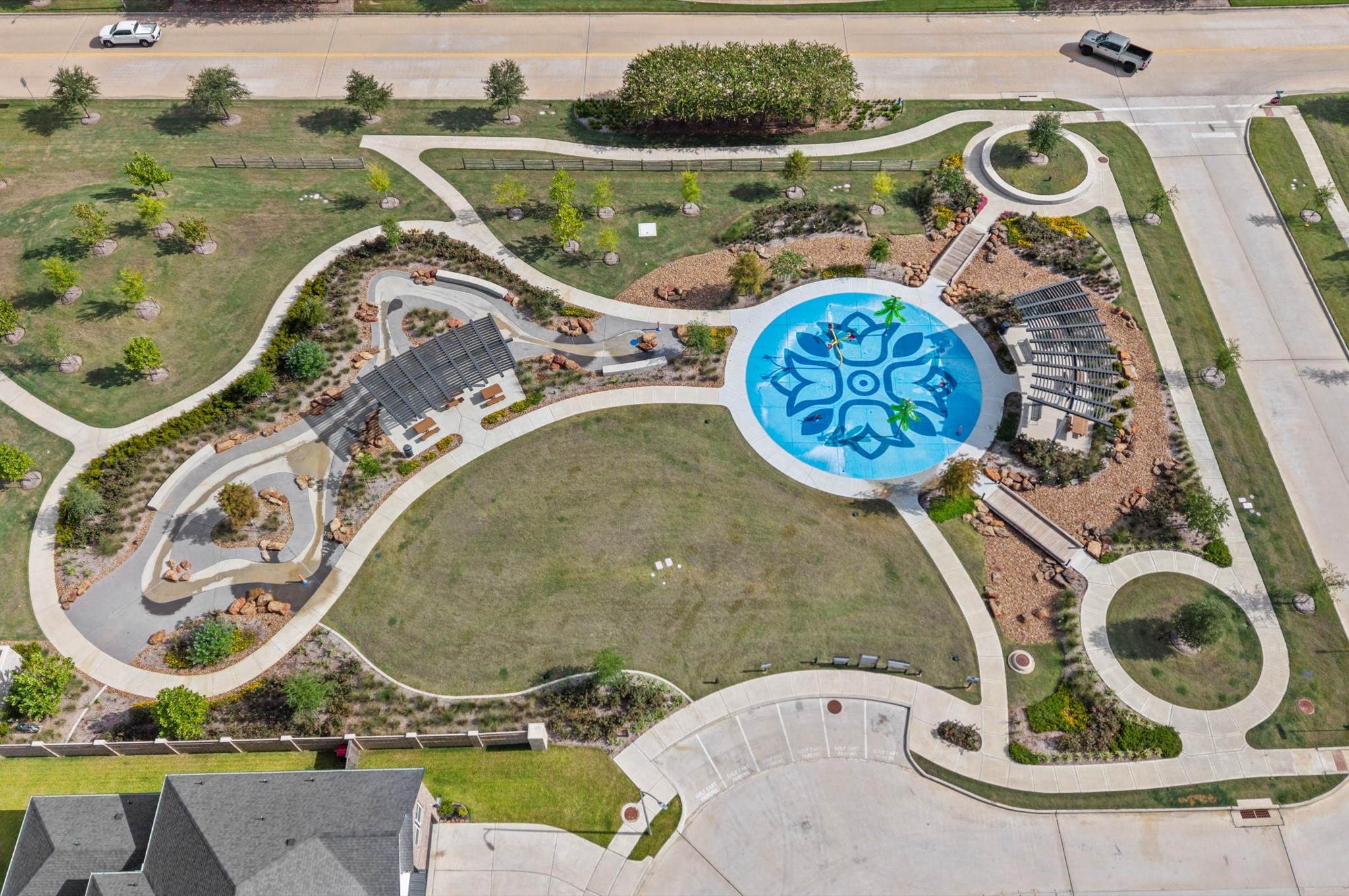 Photo of the splash pad and park area.