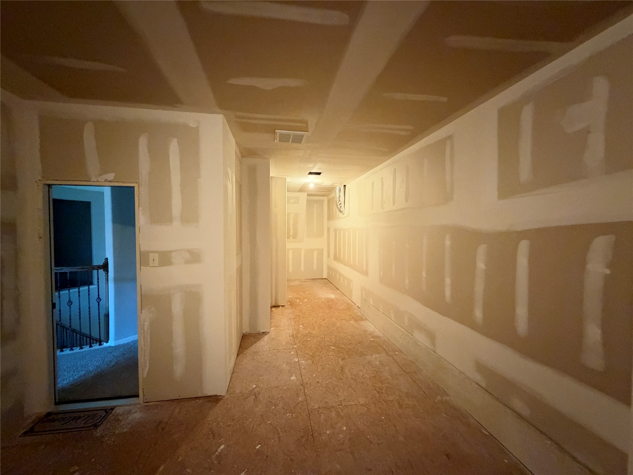 The bonus: a remarkably large, unfinished but air-conditioned space ready for your imagination.