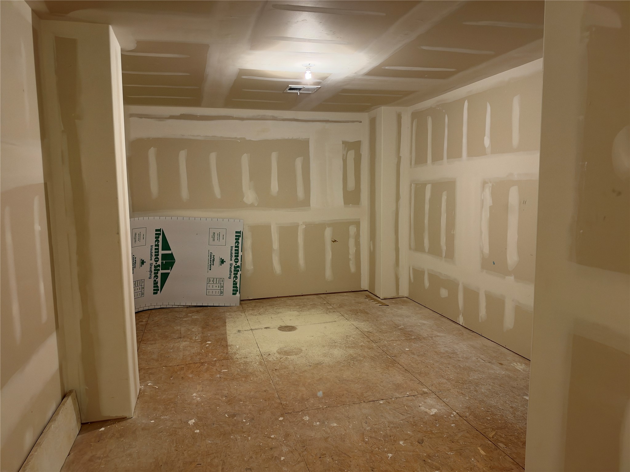 The bonus: a remarkably large, unfinished but air-conditioned space ready for your imagination.