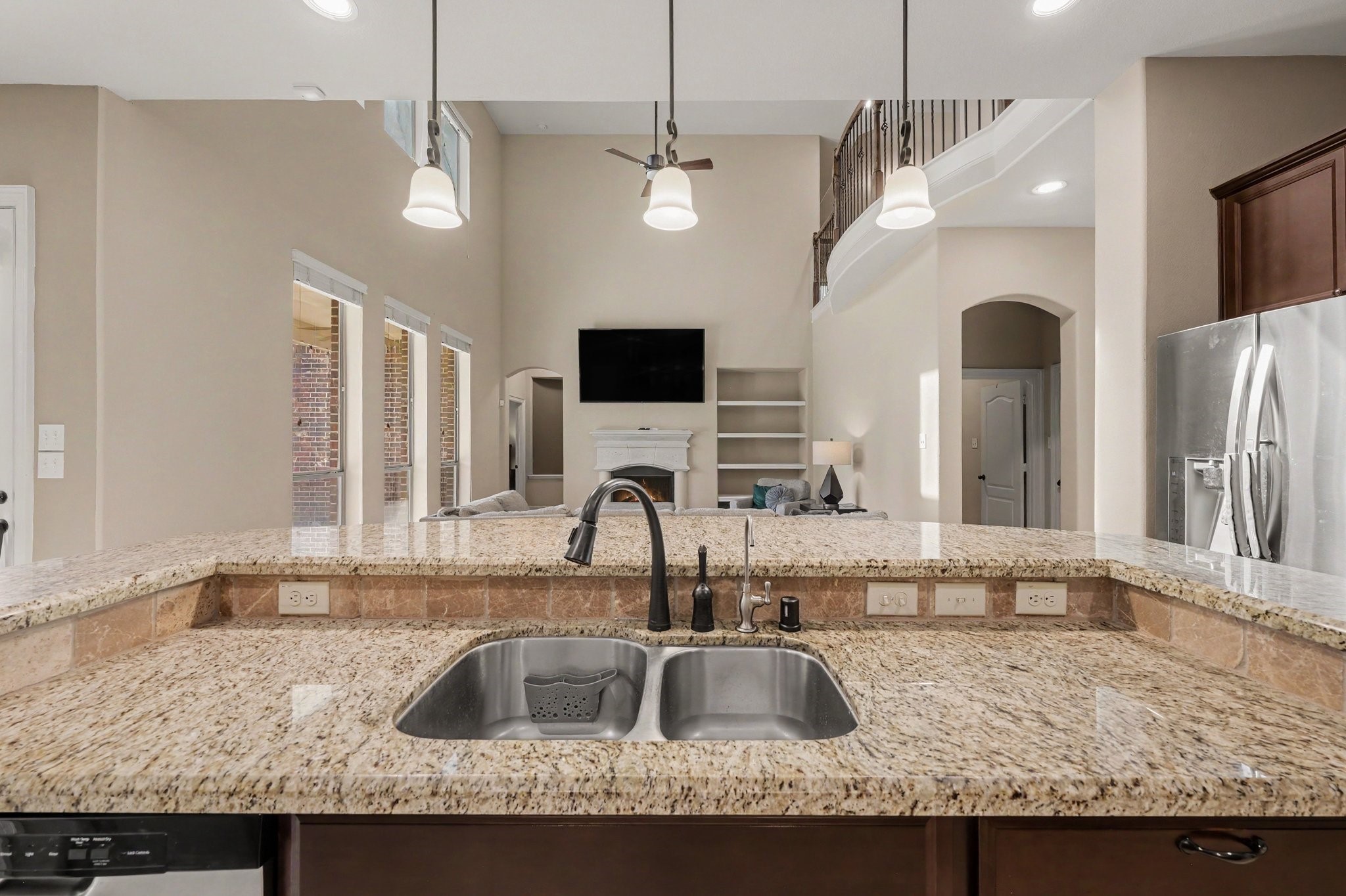 The open kitchen overlooks the two story living room.