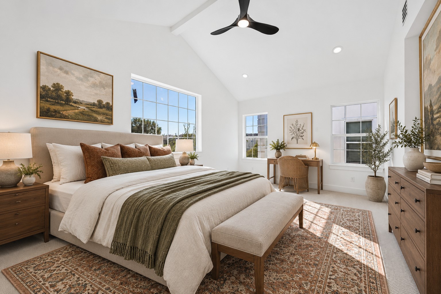 Spacious third-floor secondary bedroom features a soaring 12' vaulted ceiling w/ decorative accent beam, plush carpet, recessed lighting & modern ceiling fan. Large windows offer abundant natural light, while an oversized walk-in closet provides built-in shelving, hanging rods & dresser drawers. Photo is virtually staged.