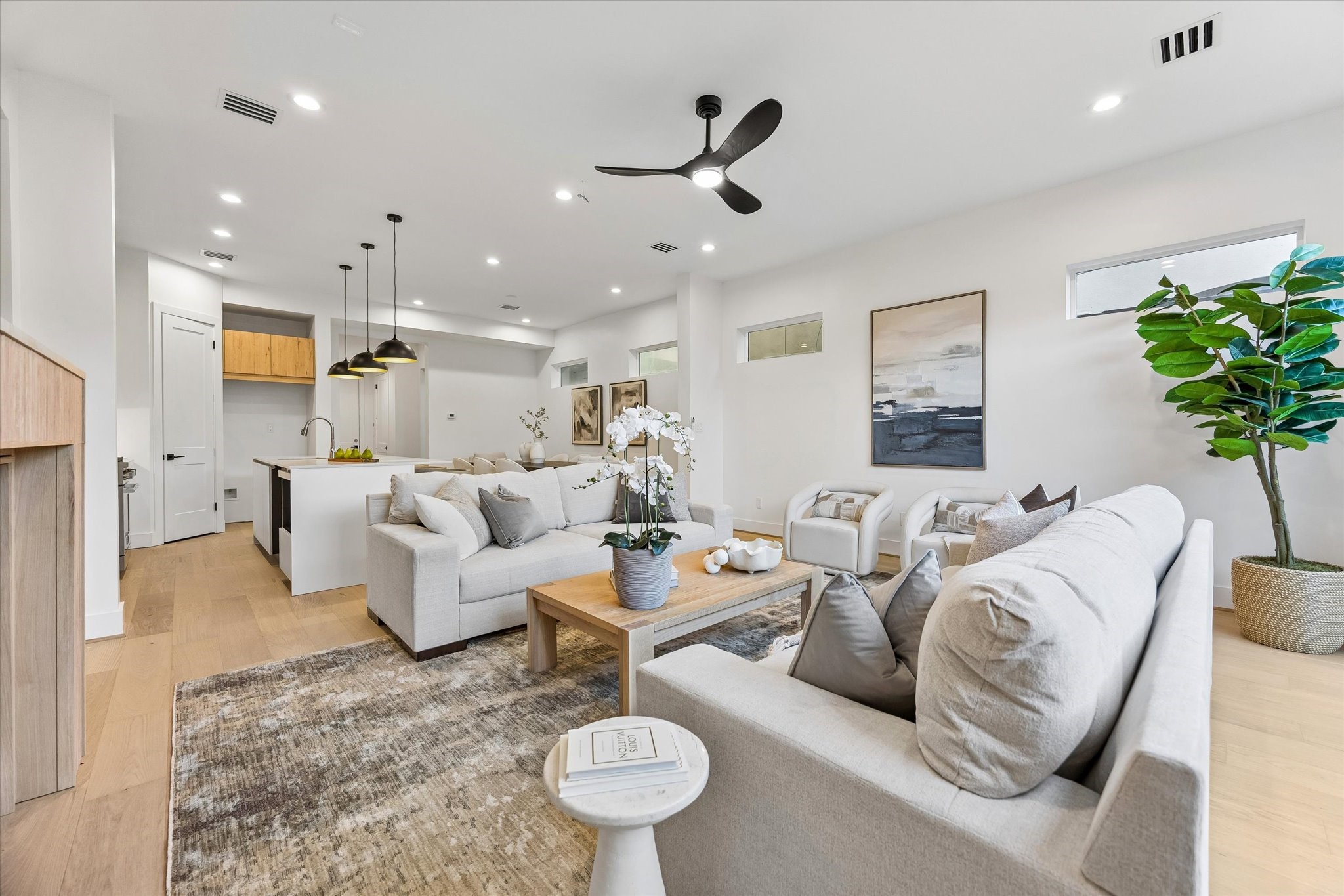 One more of this spacious family room highlighting the seamless open floor plan to kitchen & dining! Ideal for entertaining and every day living!