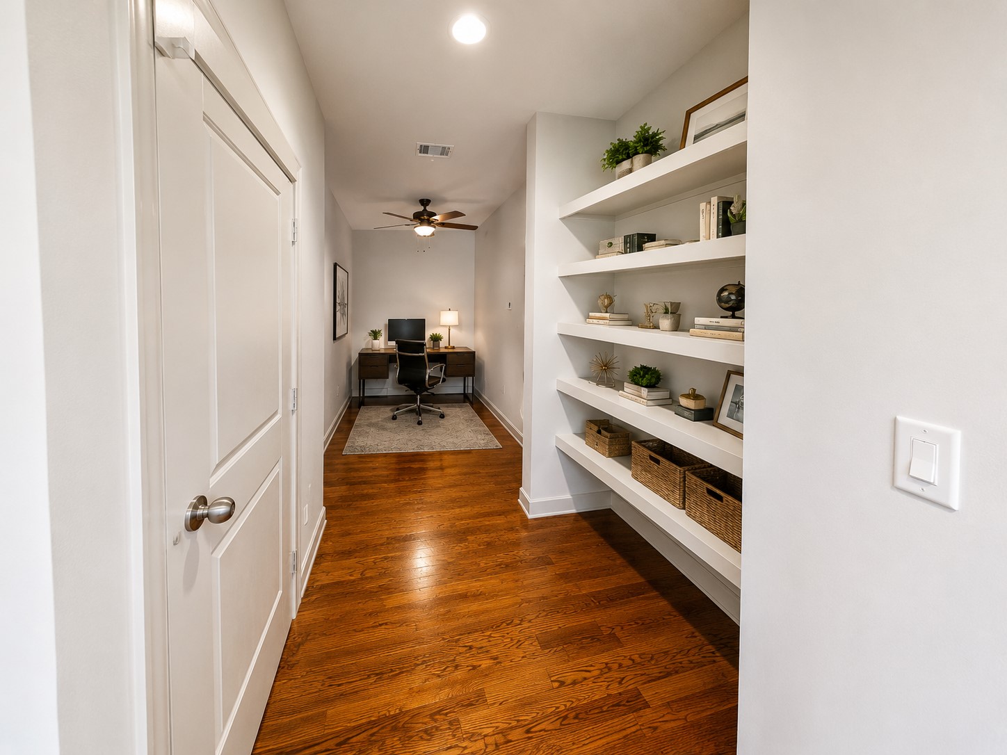 Welcoming entry opens to a versatile private study, offering the perfect space for a refined home office or flex room.