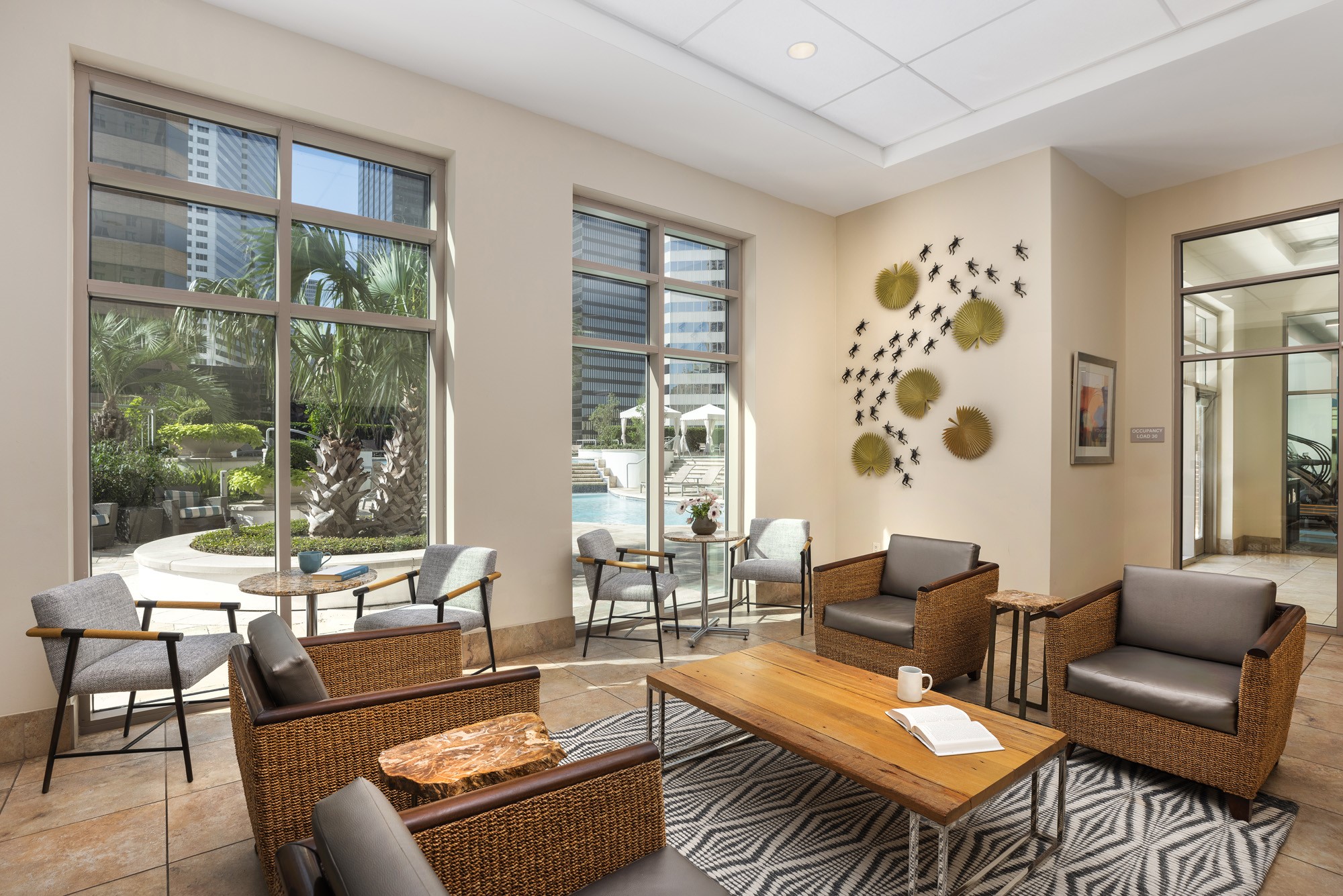 Welcome to the hub of the building where neighbors meet for coffee in the morning, read the newspaper, hit the gym, go for a swim and get their day started!