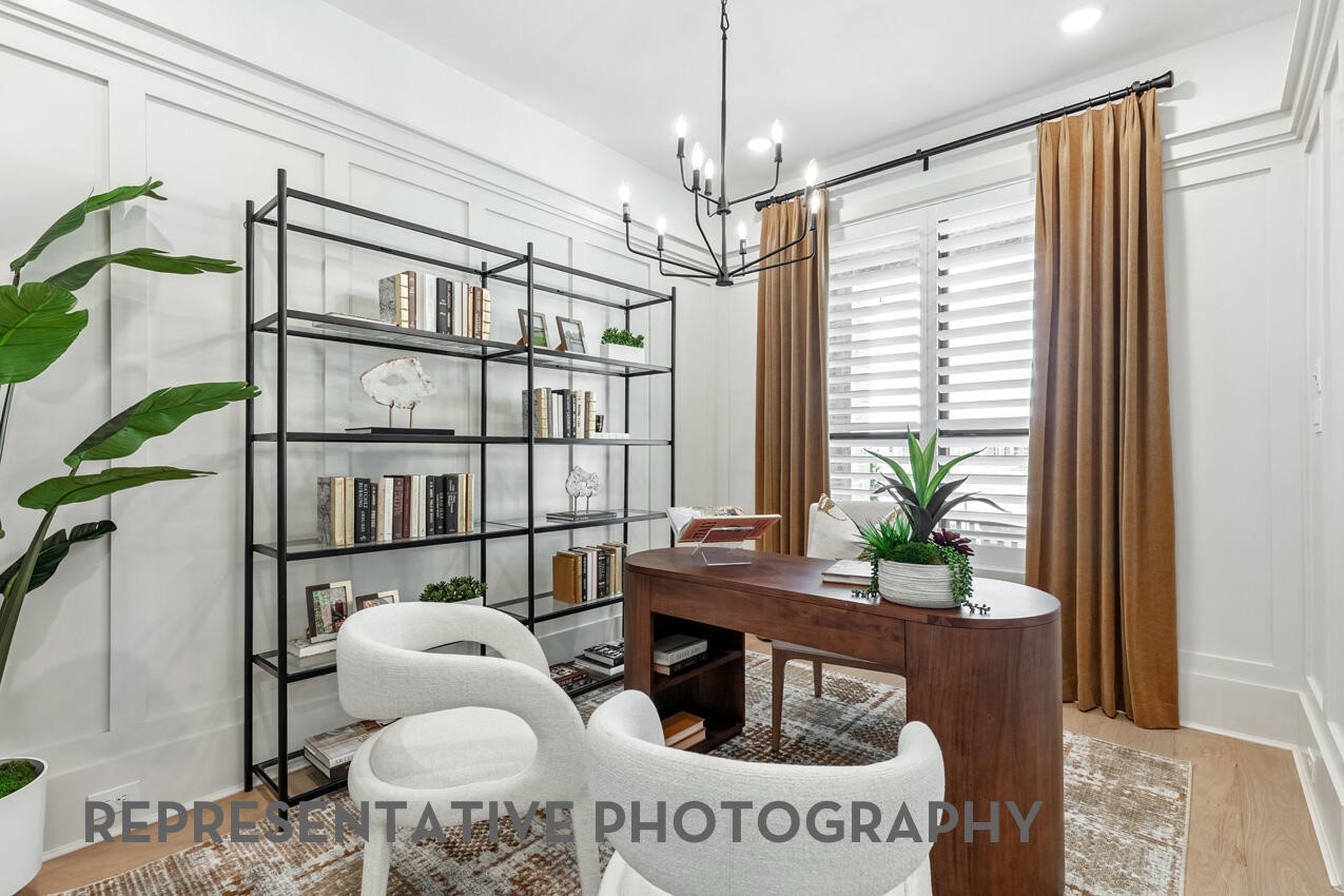 Dedicated home office with abundant natural light, and a sophisticated workspace.