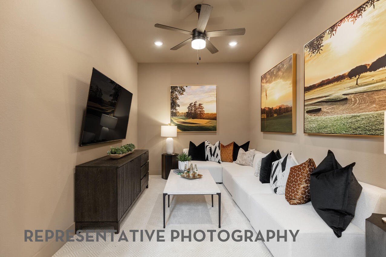 Entertainment room/Flex space designed for movie nights, game days, and relaxing with family and friends.