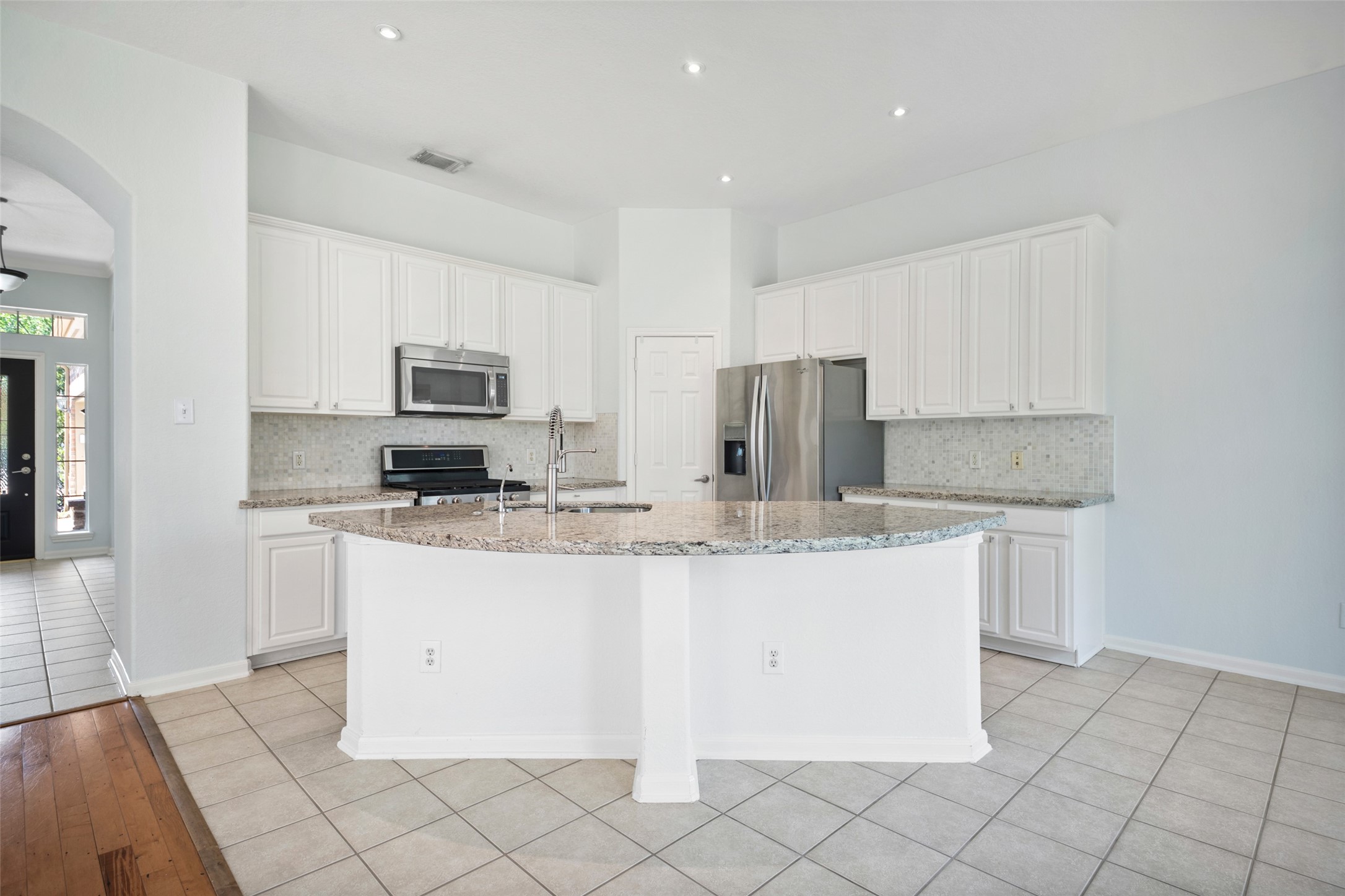 large island great for entertaining. open to main living area
