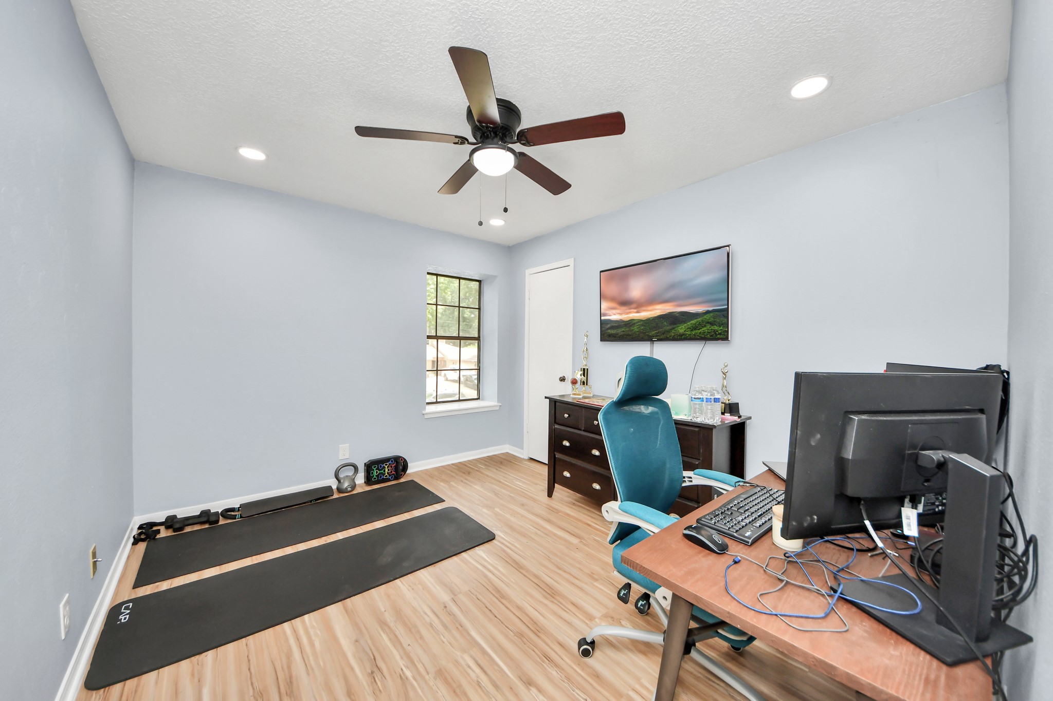 An adaptable footprint. This well-proportioned room easily transitions from a plush guest suite to a quiet executive study.