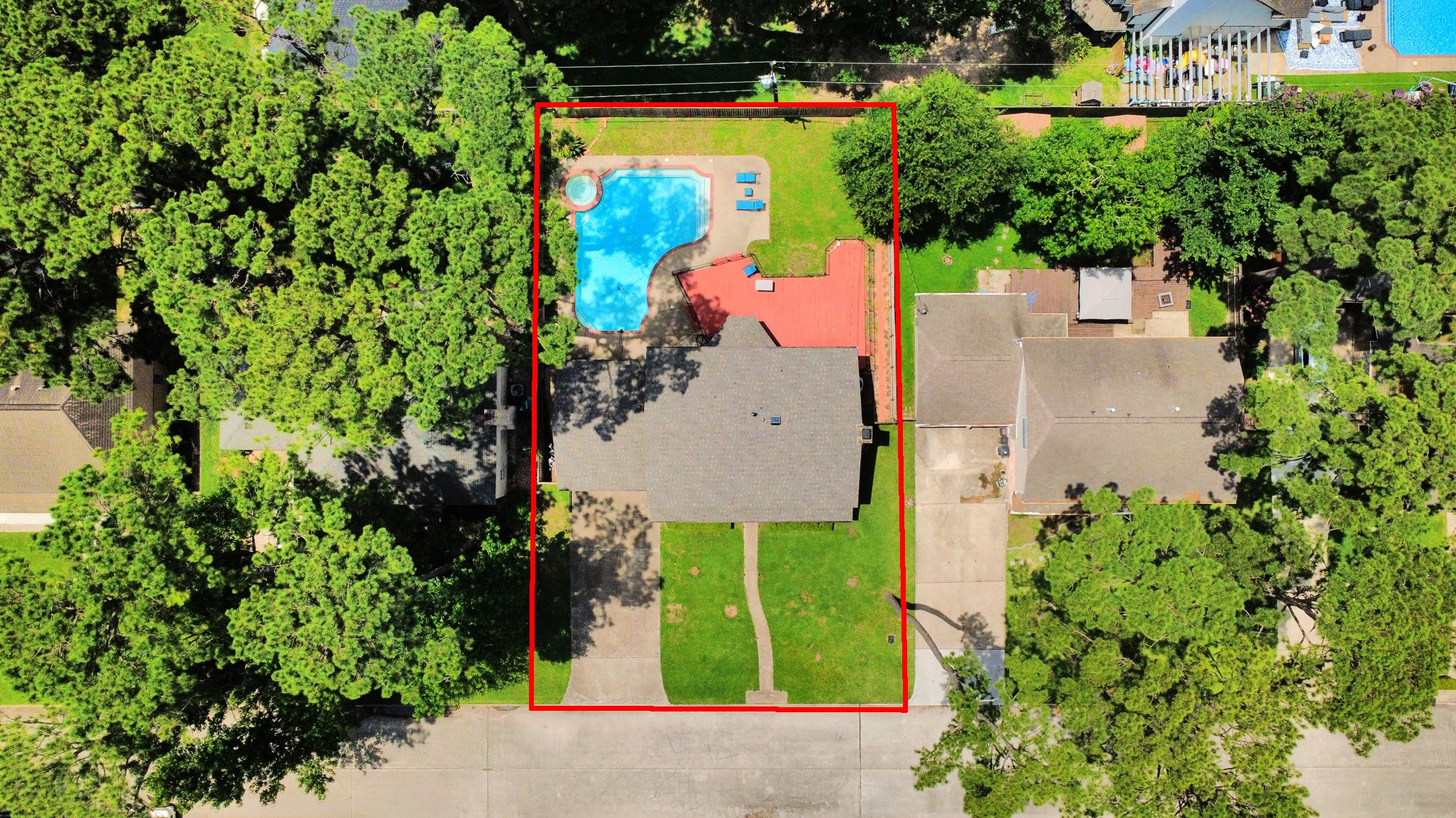 A birds-eye view of pure potential. This precise, top-down perspective showcases the true scale of the lot, illustrating how perfectly the residence, sweeping yard, and pool pavilion harmonize together.