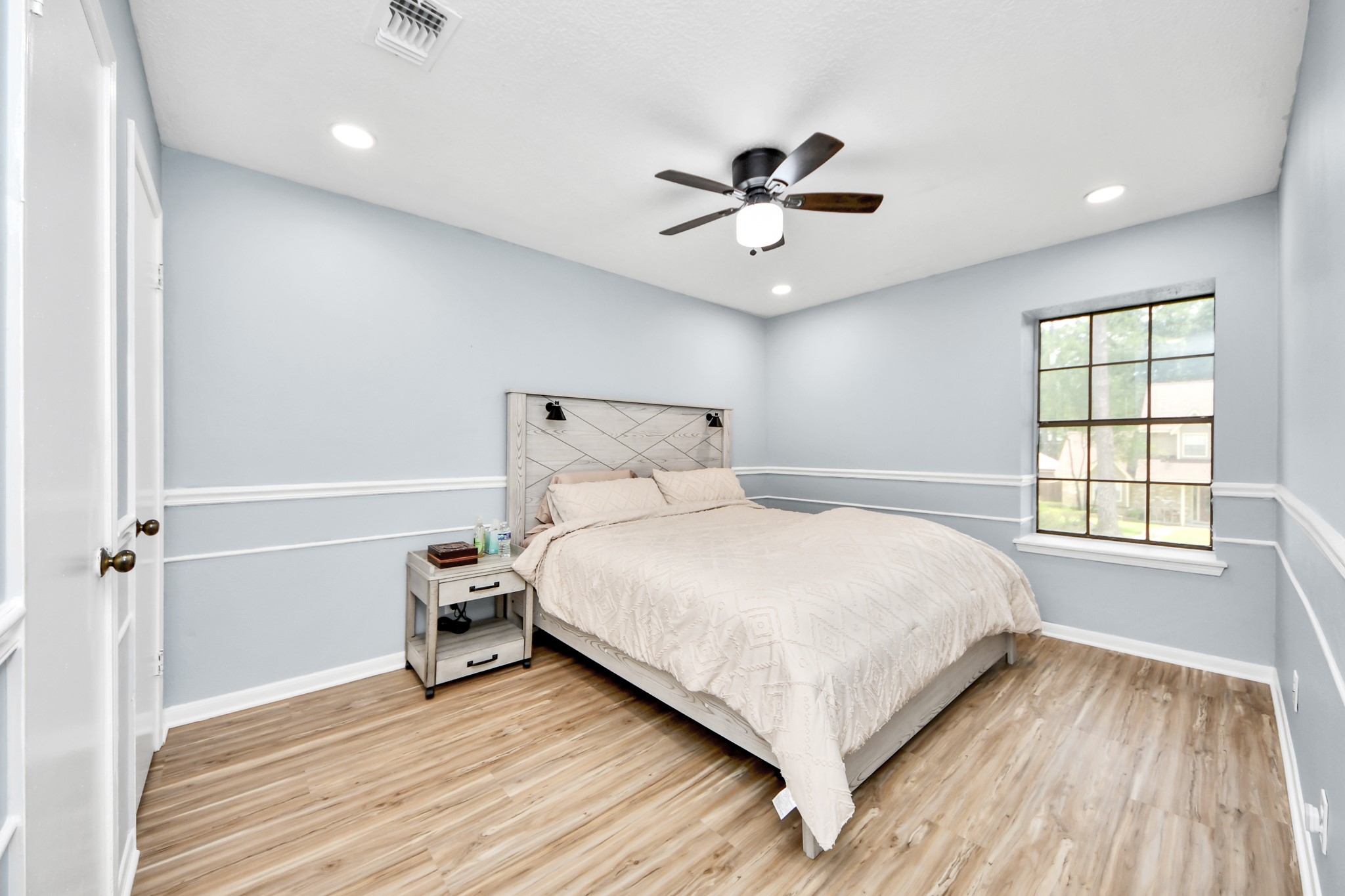 Charming architectural character. This restful bedroom features a built-in window seat that serves as a picturesque nook for reading or quiet contemplation.