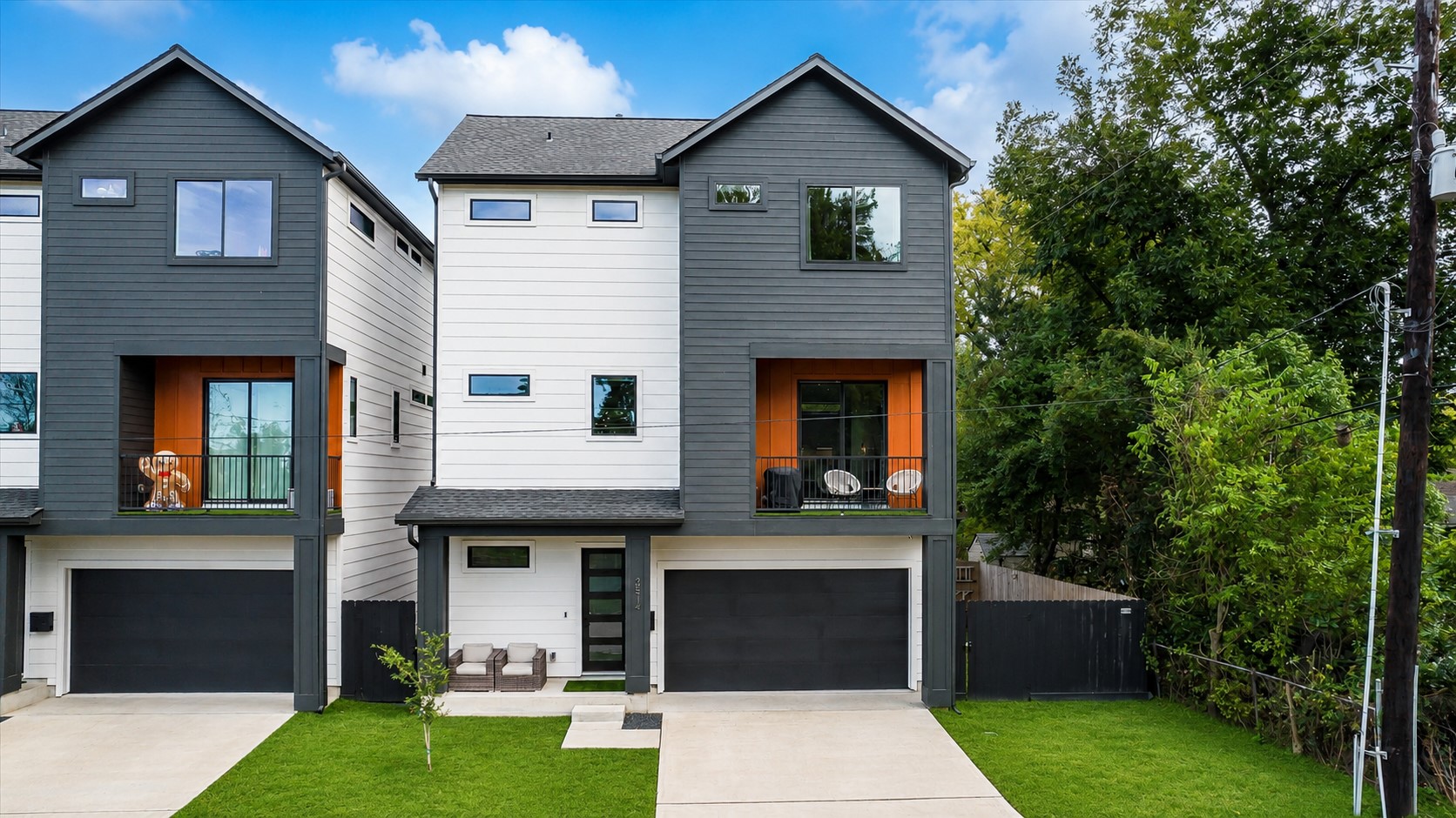 Modern contemporary home in sought-after Independence Heights featuring clean architectural lines, an oversized lot, covered balcony, spacious front porch, and exceptional curb appeal just minutes from Downtown Houston and The Heights. Covered balcony creates an inviting outdoor extension of the home, ideal for morning coffee or evening relaxation.