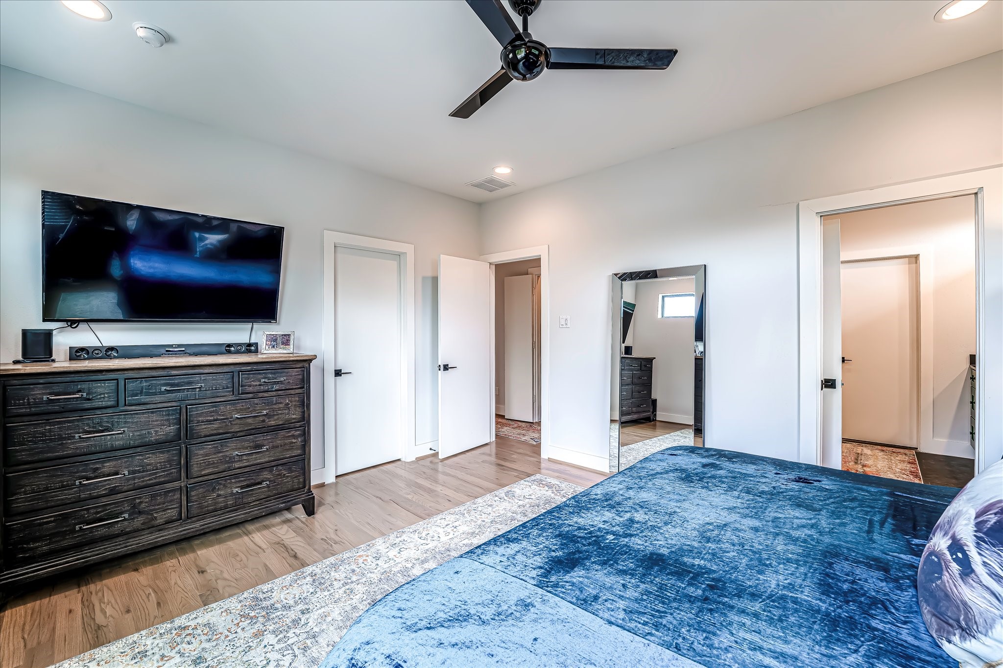 Note two separate walk-in closets in the primary suite, providing exceptional storage and organization.Photos reflect previous furnishings. Home is currently vacant. Furnishings shown are for illustrative purposes only.