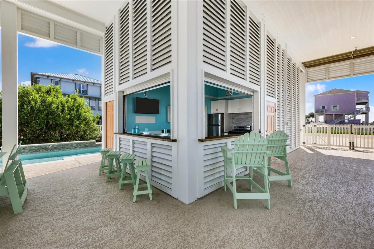 Ground level kitchen with half bath and rolling counter shutters