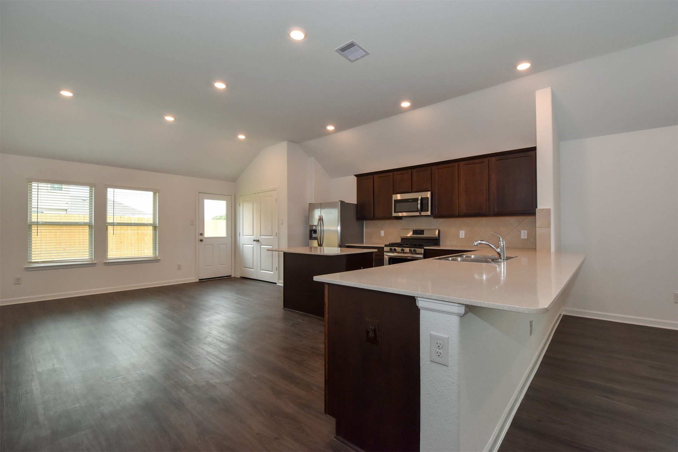 Kitchen / dining combo, gorgeous view of the backyard