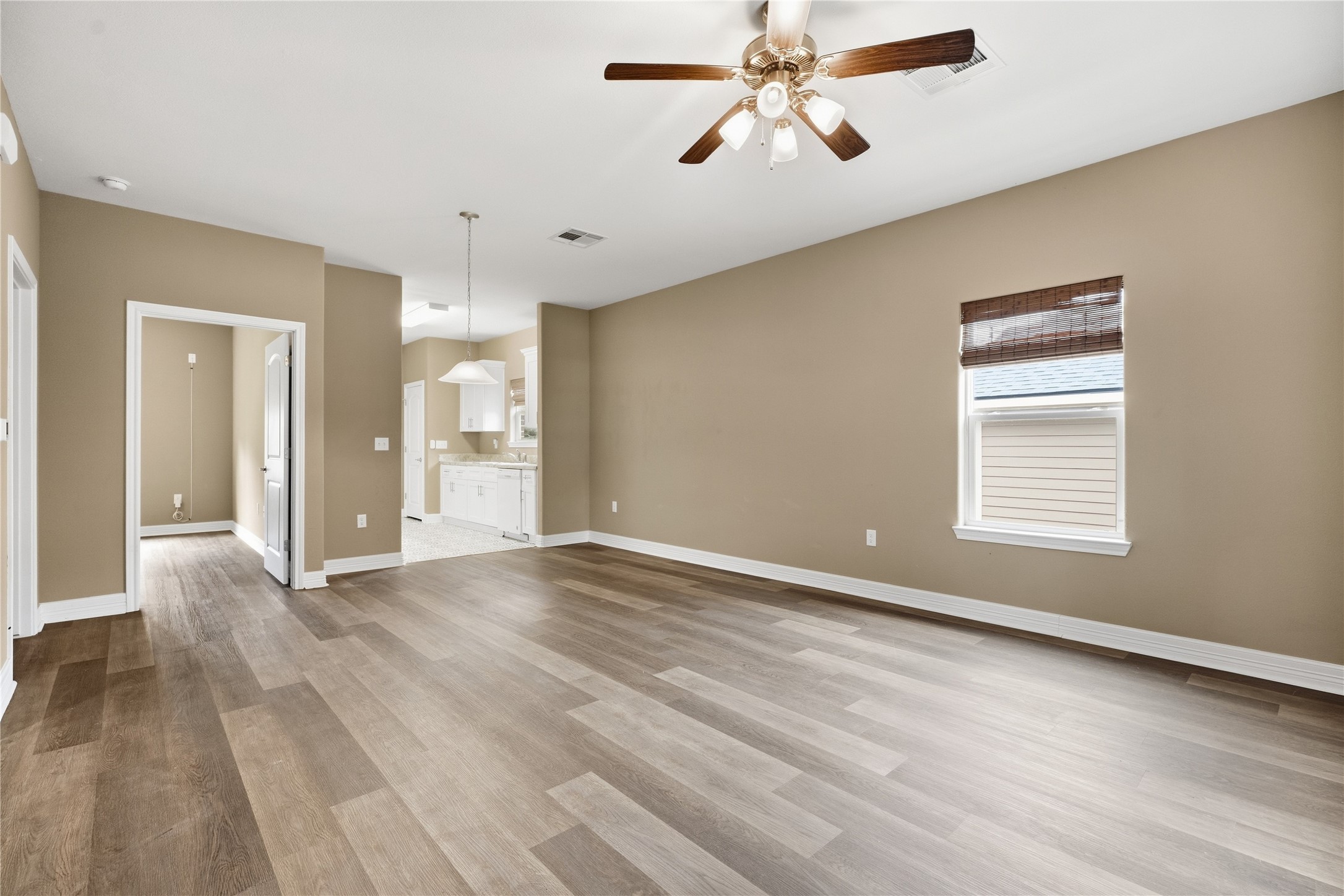 The living room opens to the dining area and kitchen, making it easy to visit with guests while preparing a meal.