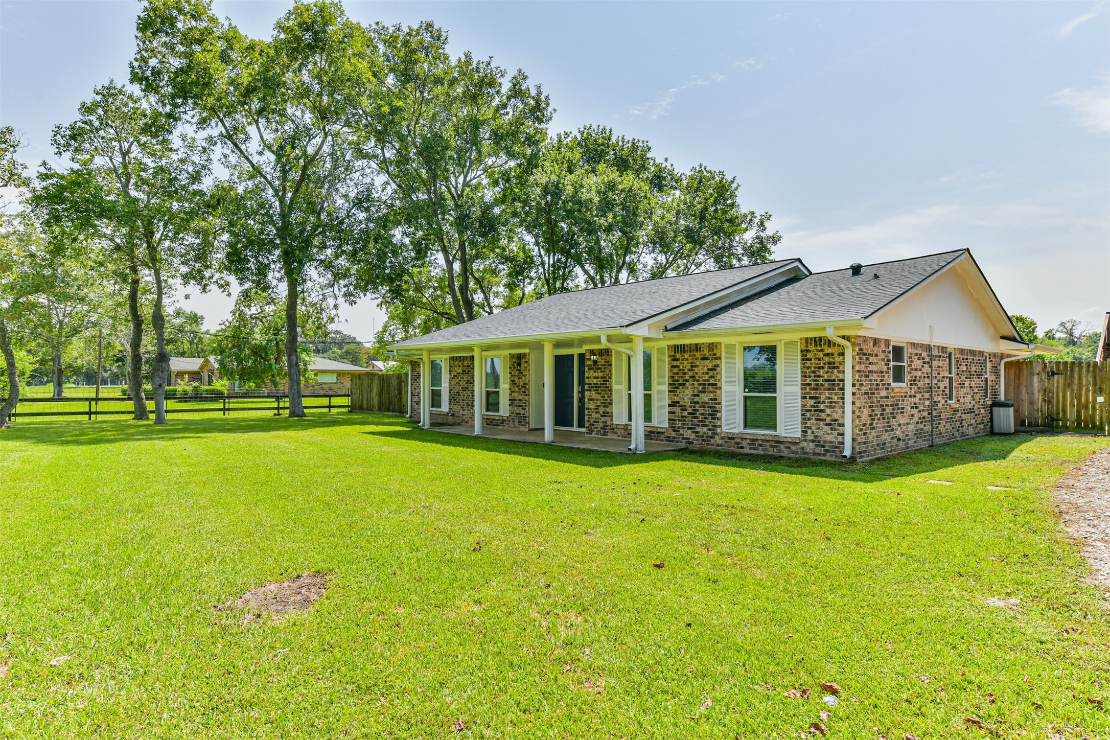 Discover your perfect retreat in this charming home, nestled amidst lush greenery. Enjoy the spacious yard and welcoming ambiance. Your dream home awaits!